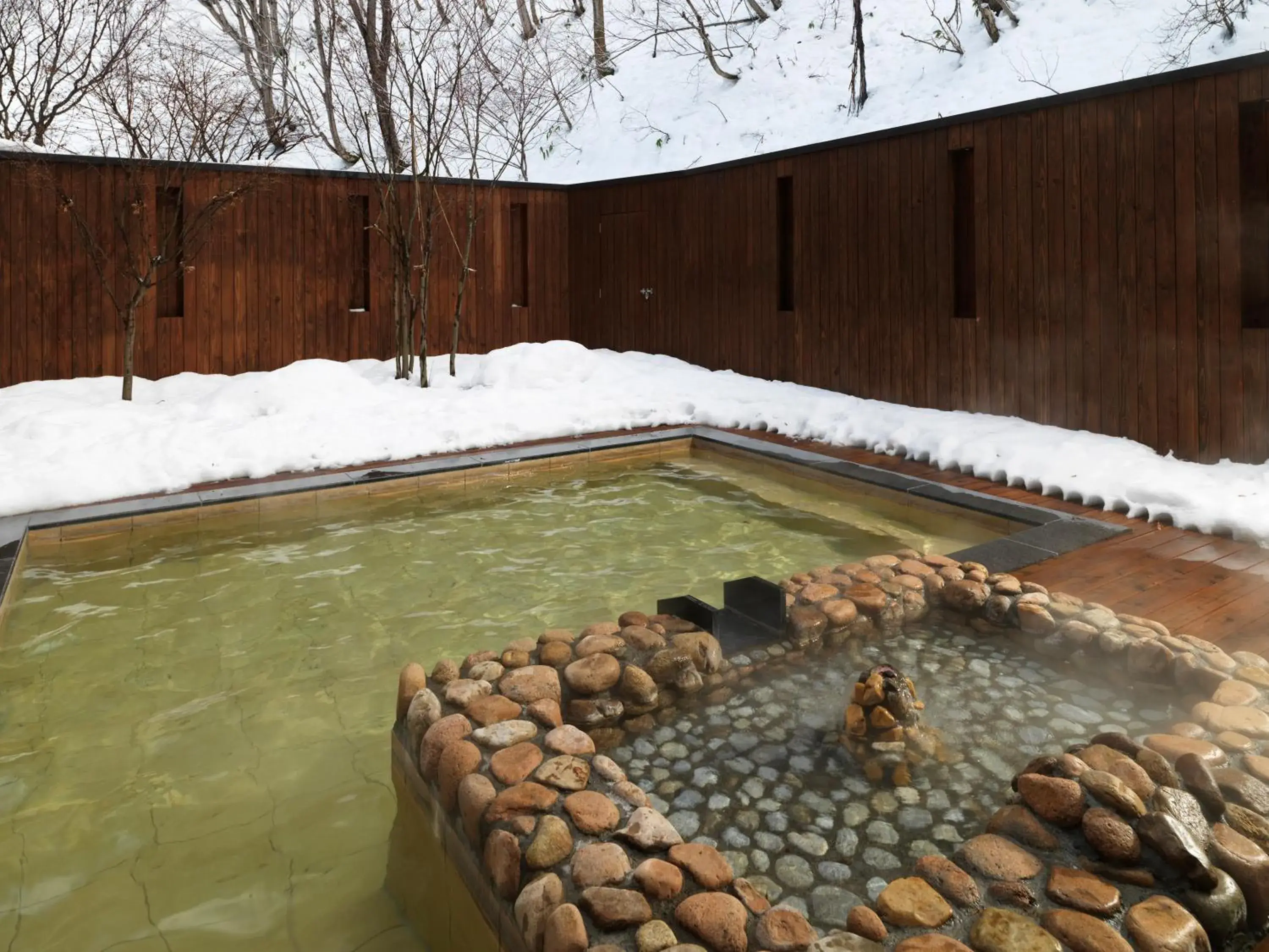 Hot Spring Bath, Swimming Pool in Niseko Konbu Onsen Tsuruga Besso Moku No Sho