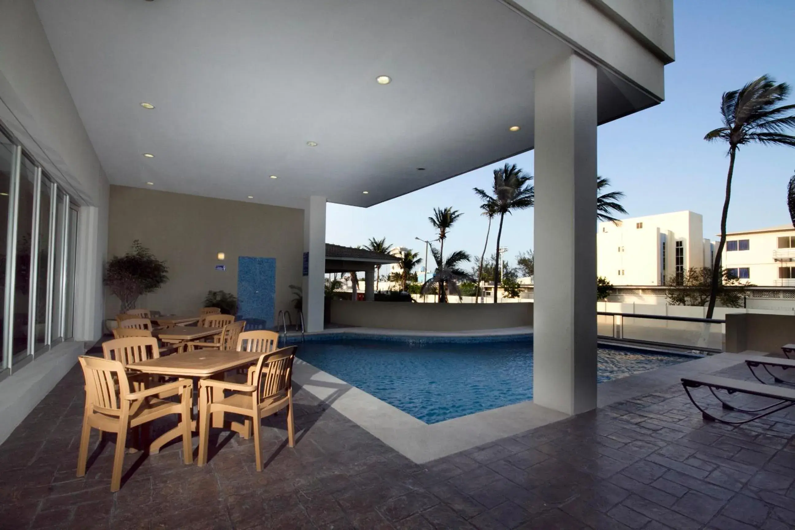 Balcony/Terrace, Swimming Pool in Balajú Hotel & Suites