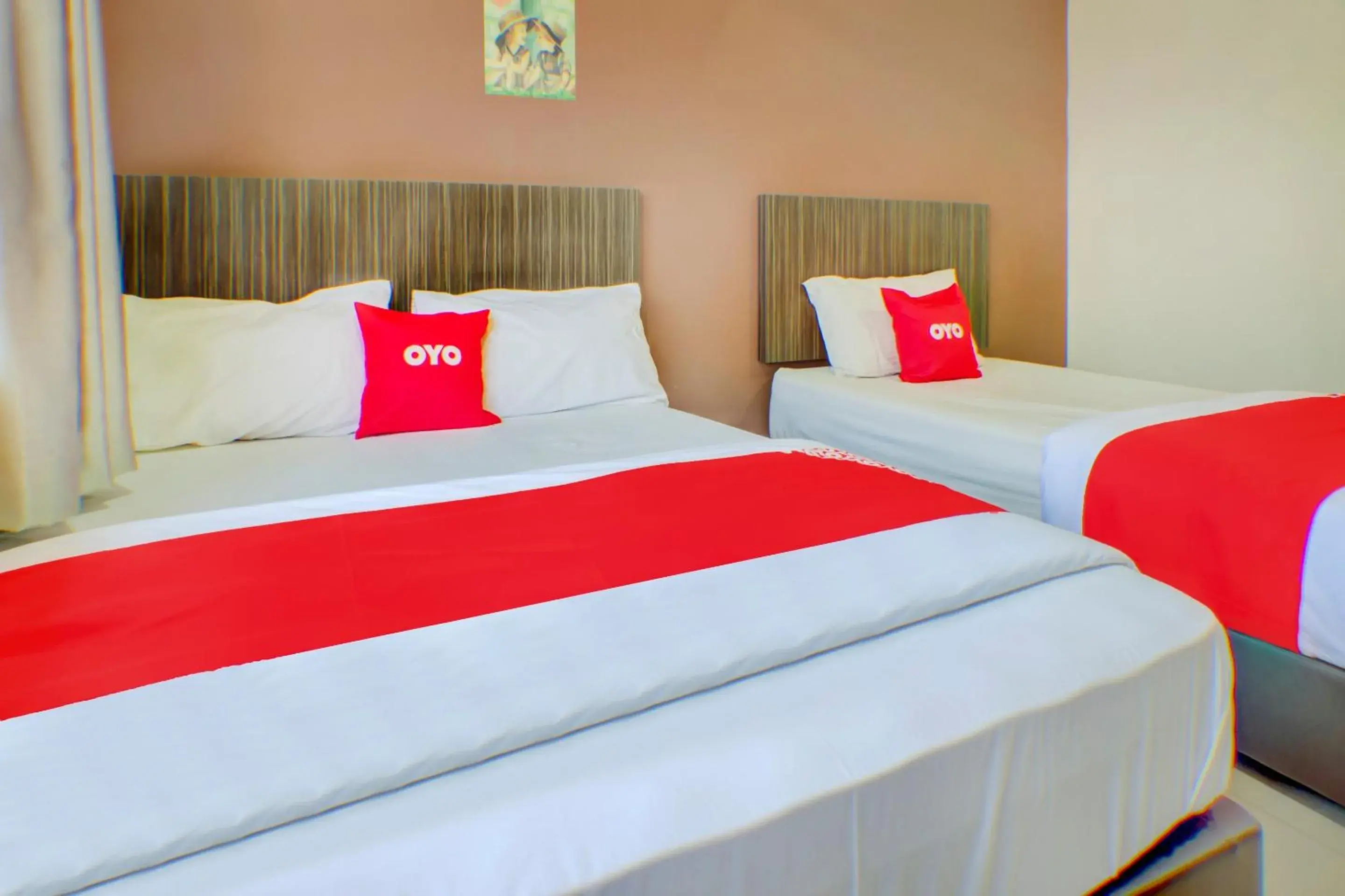 Bed in OYO 89985 Js Hotel