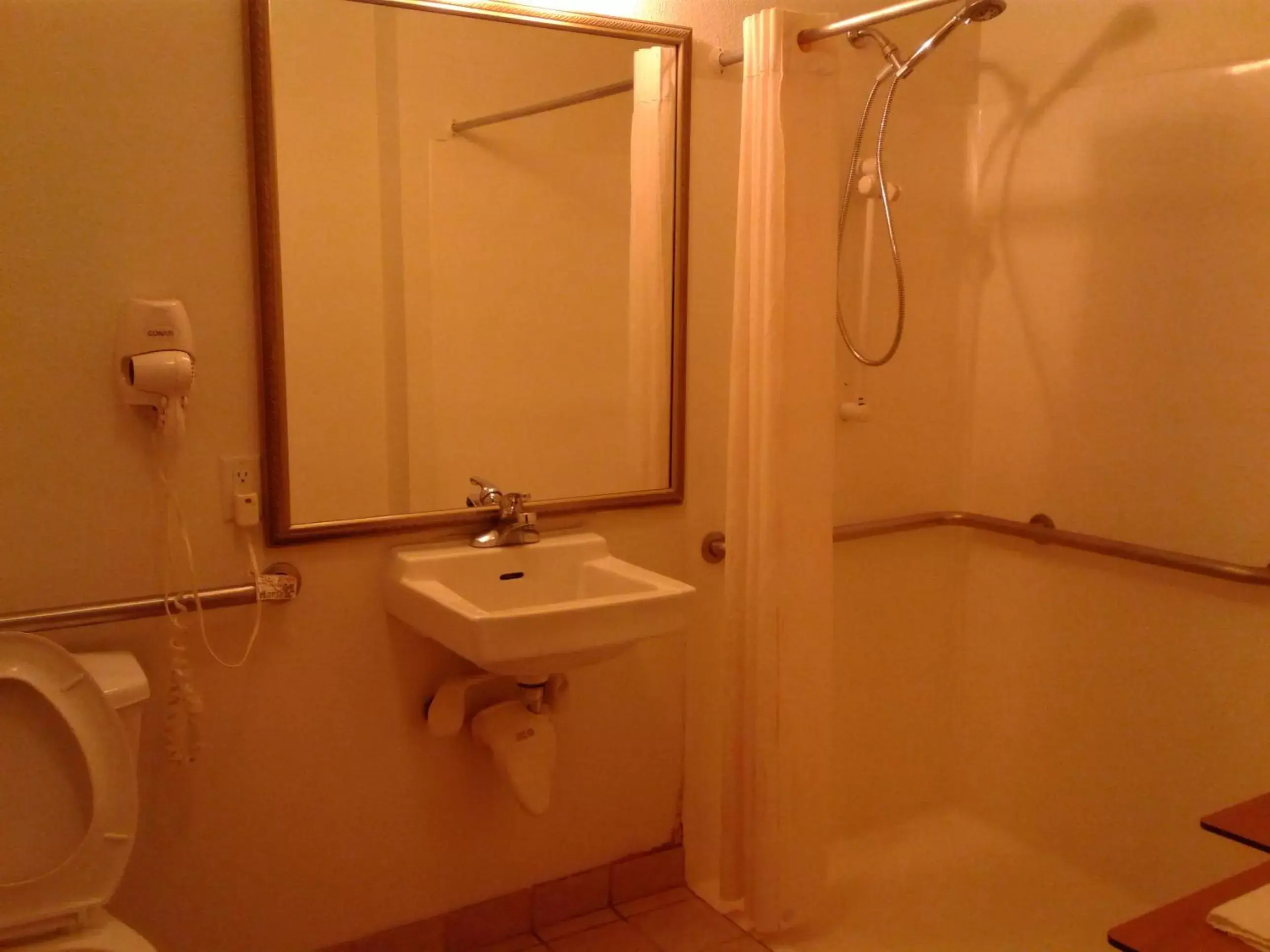 Bathroom in Super 8 by Wyndham Garland/Rowlett/East Dallas area