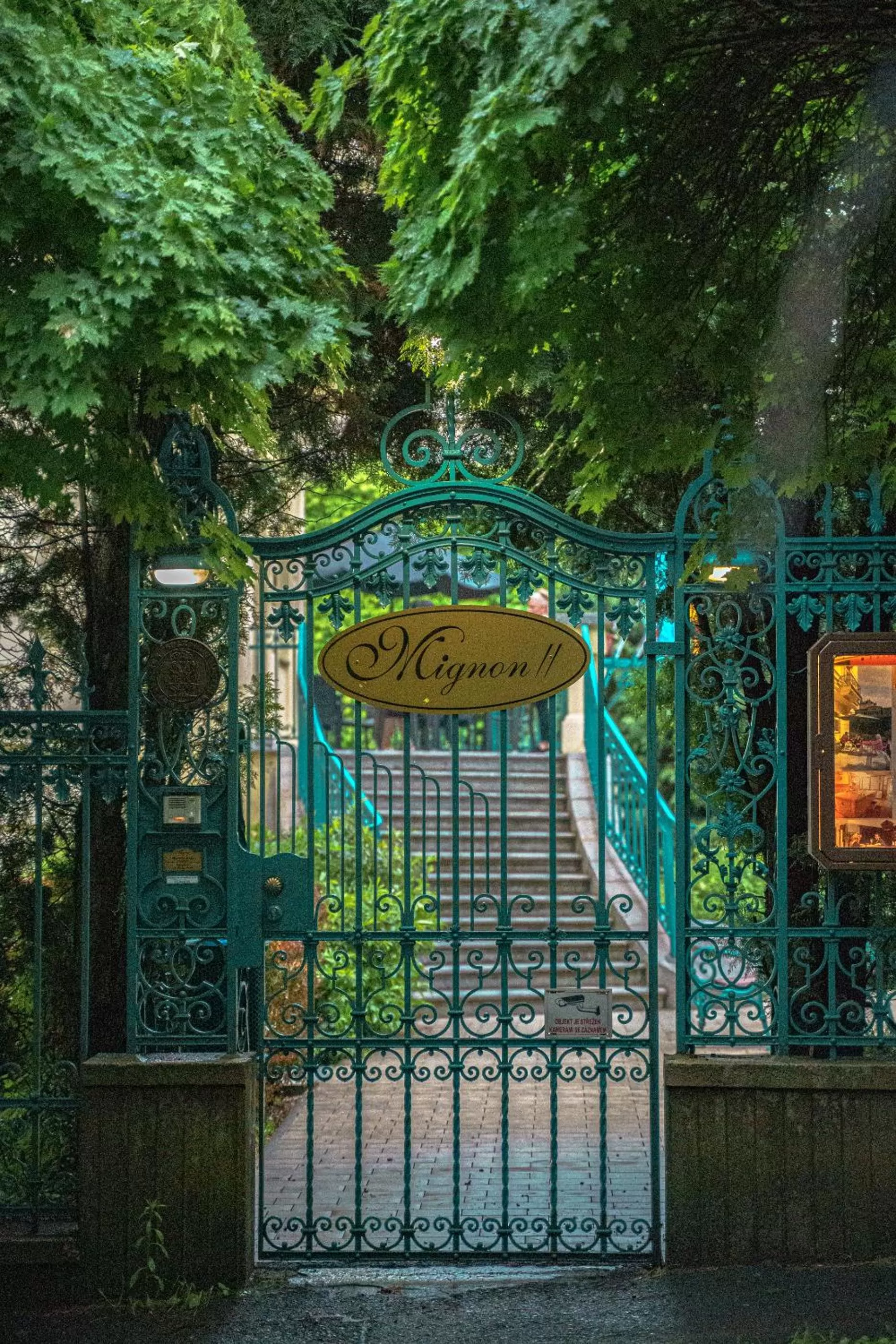 Property logo or sign in Hotel Mignon