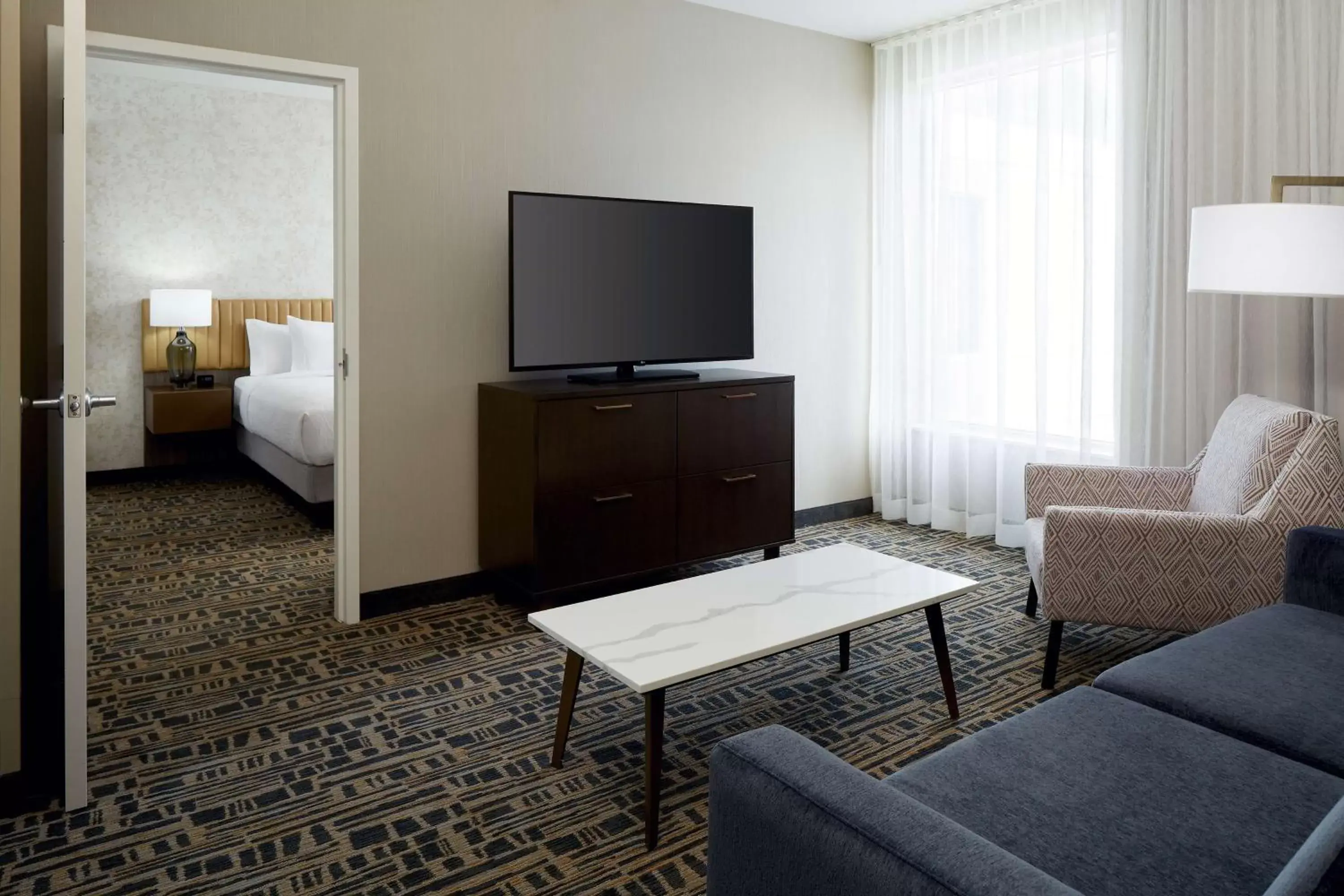Bedroom, TV/Entertainment Center in Homewood Suites By Hilton Montreal Midtown