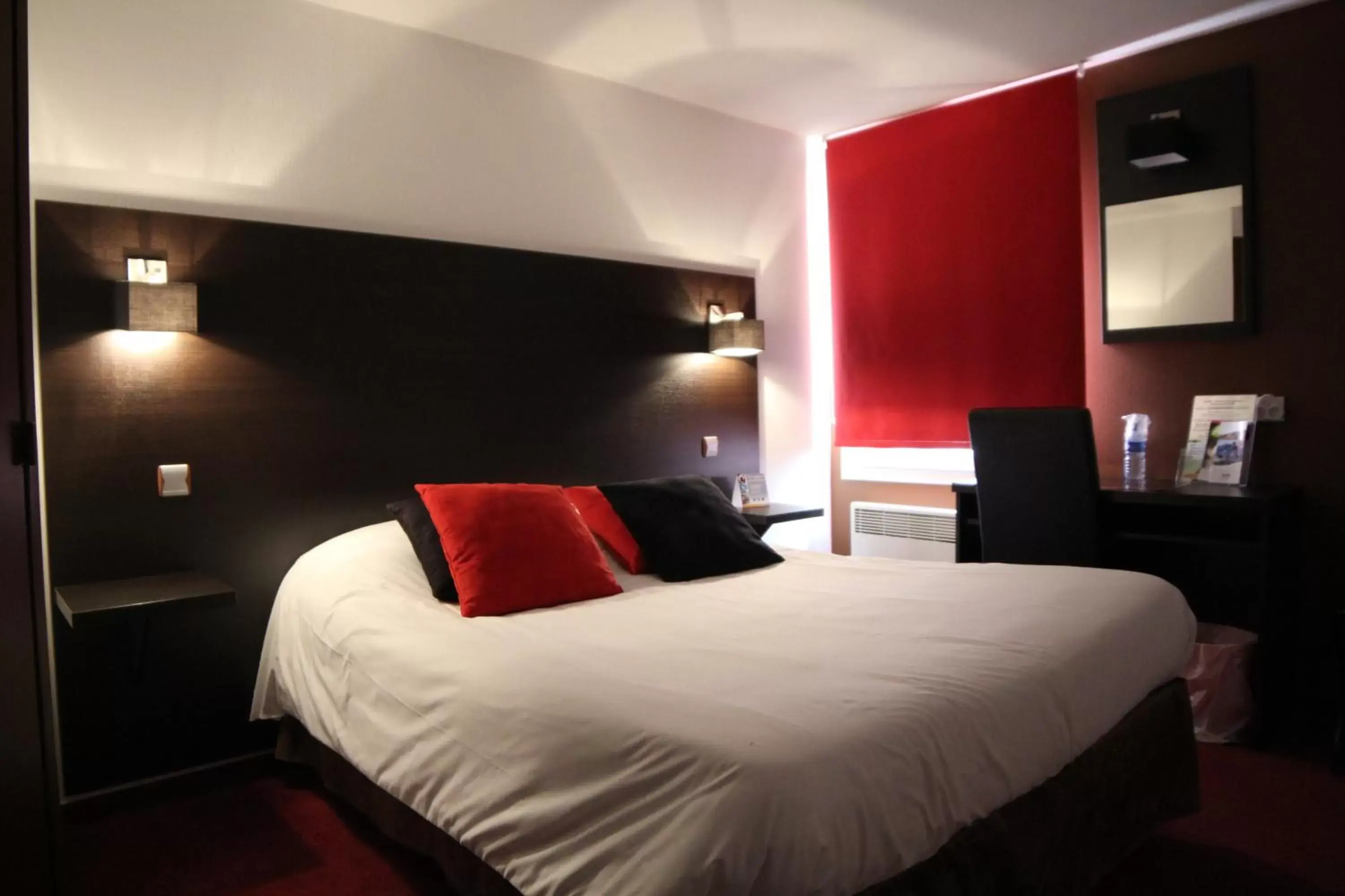 Bedroom, Bed in Logis Hotel Lons-le-Saunier - Restaurant Le Grill