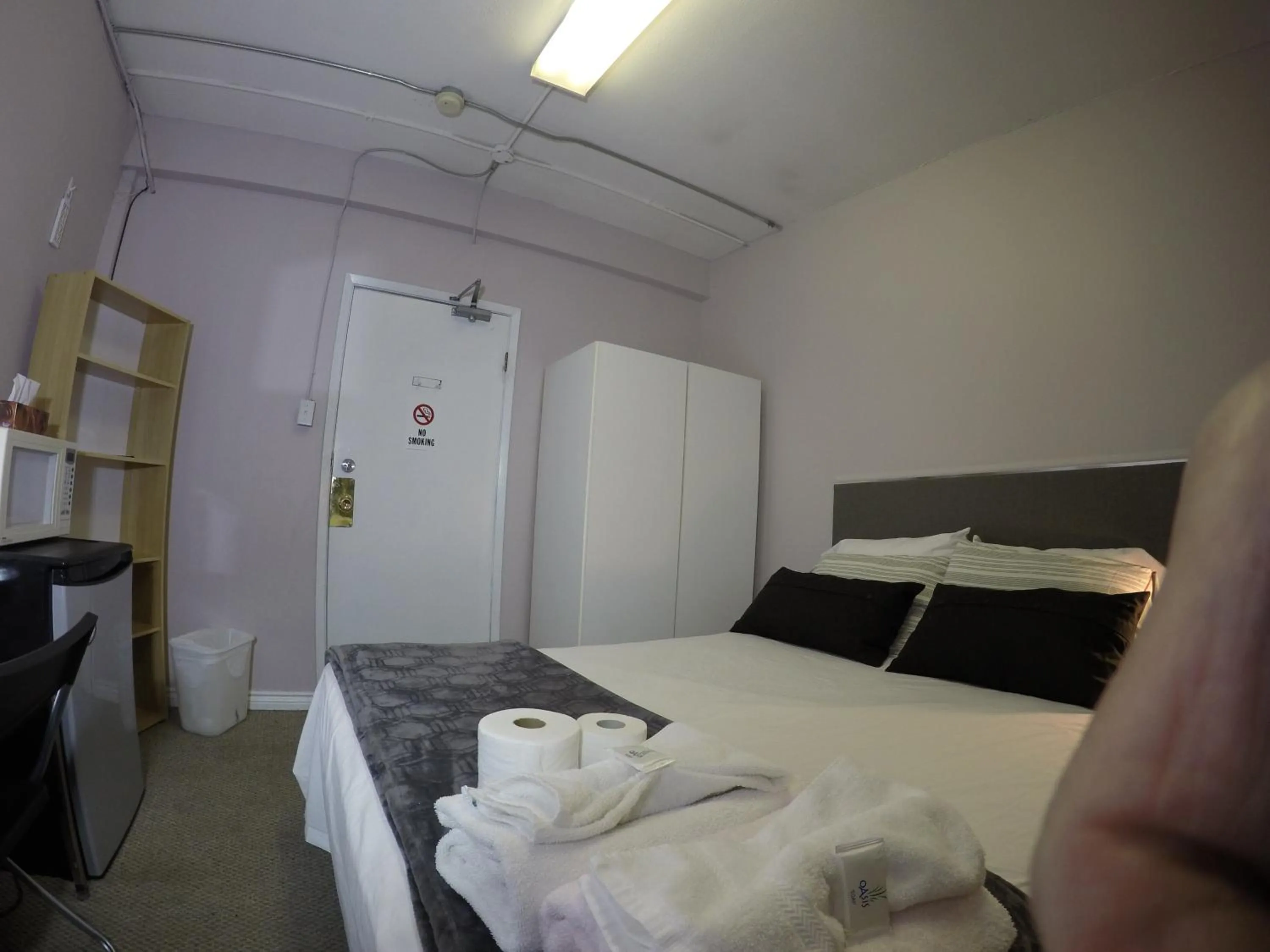 Photo of the whole room, Bed in Saint Lawrence Residences and Suites