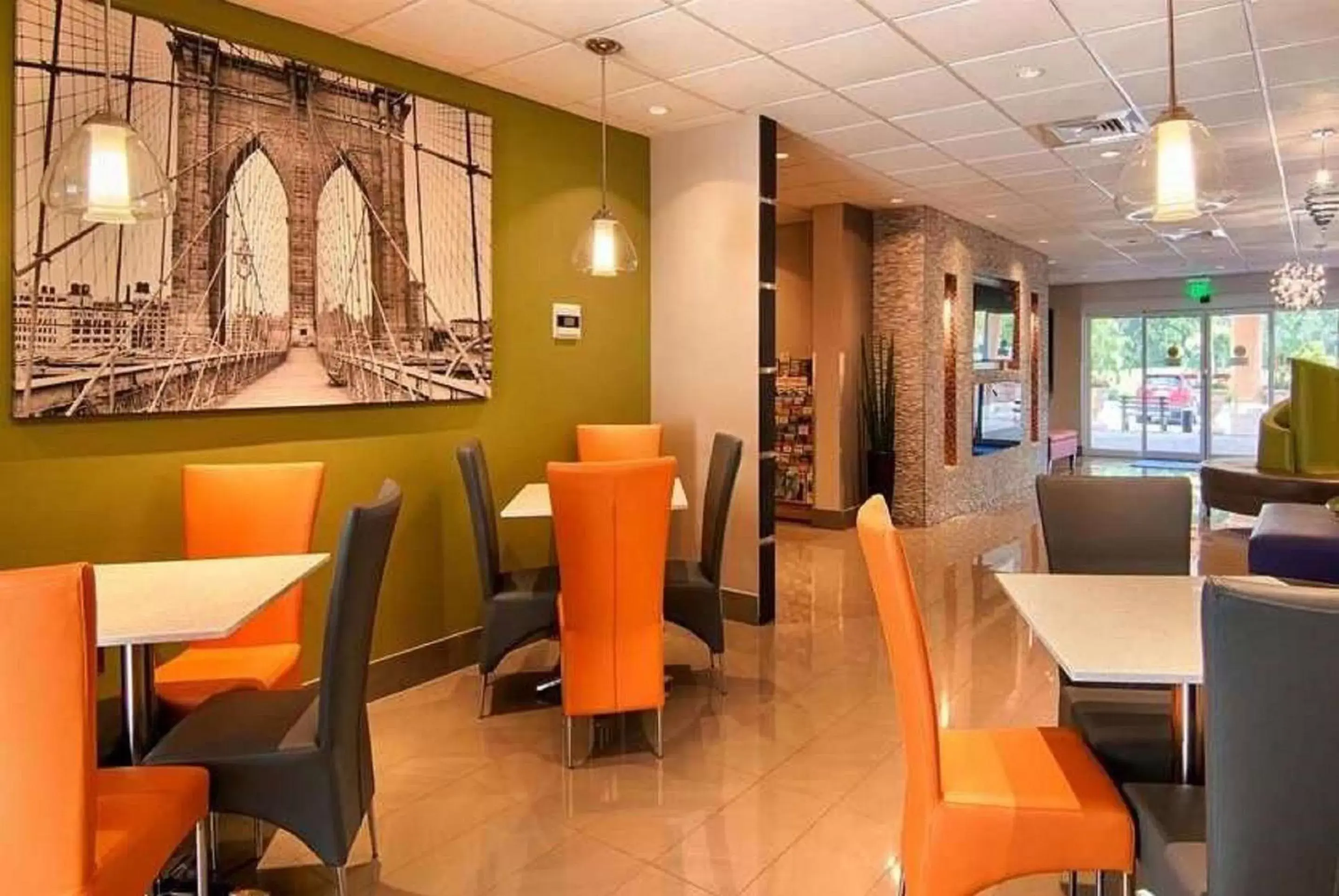Lobby or reception, Restaurant/Places to Eat in Days Inn & Suites by Wyndham Bonita Springs North Naples