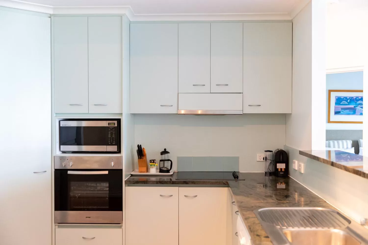 kitchen in Beaches Holiday Apartments - Official Onsite Reception & Check In