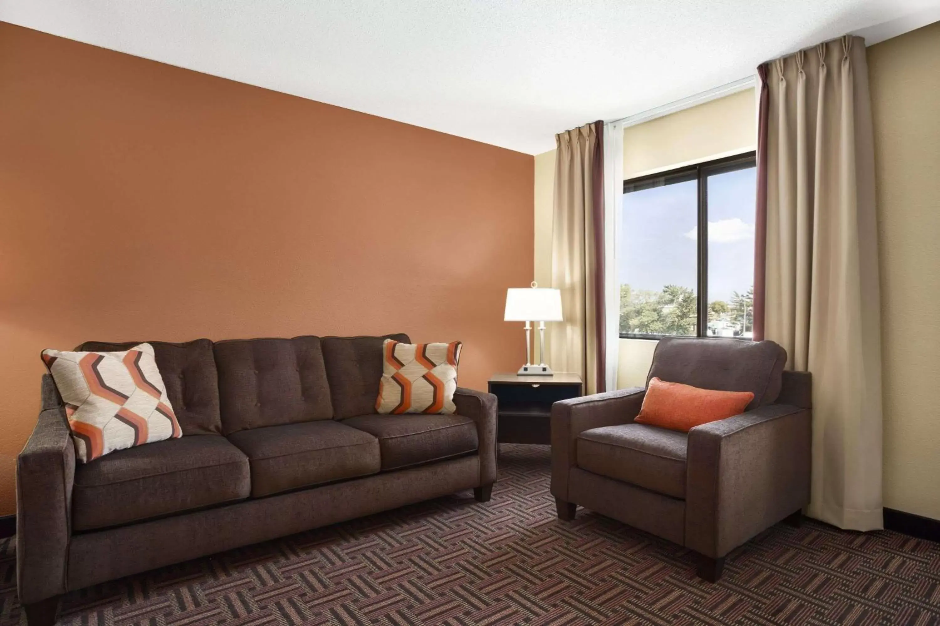 Photo of the whole room, Seating Area in Super 8 by Wyndham Carbondale