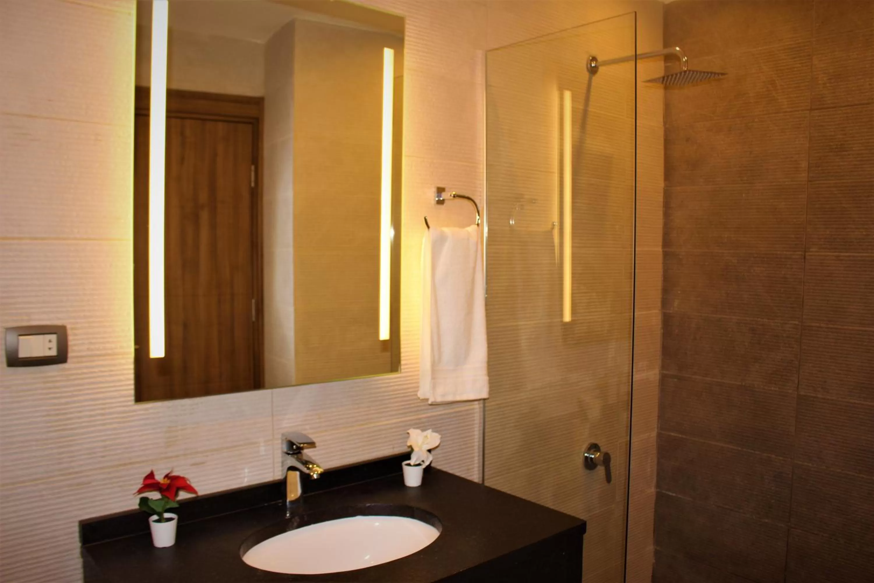 Bathroom in New MerryLand Hotel