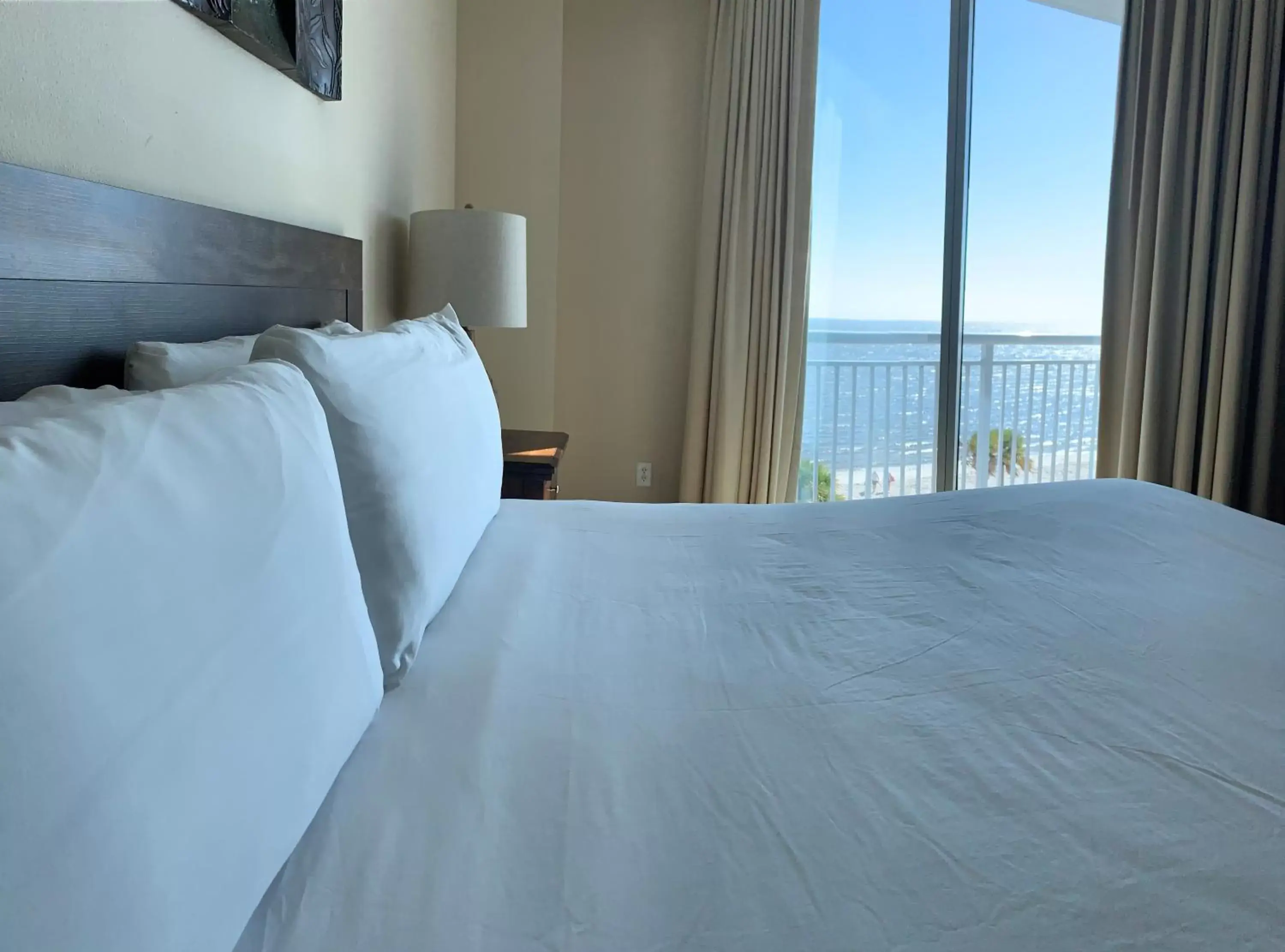 Bed in South Beach Biloxi Hotel & Suites