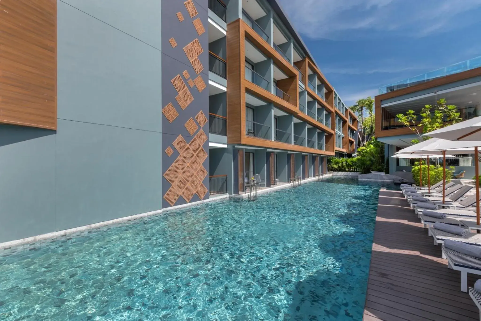 Swimming pool, Property Building in The Nature Phuket - SHA Extra Plus
