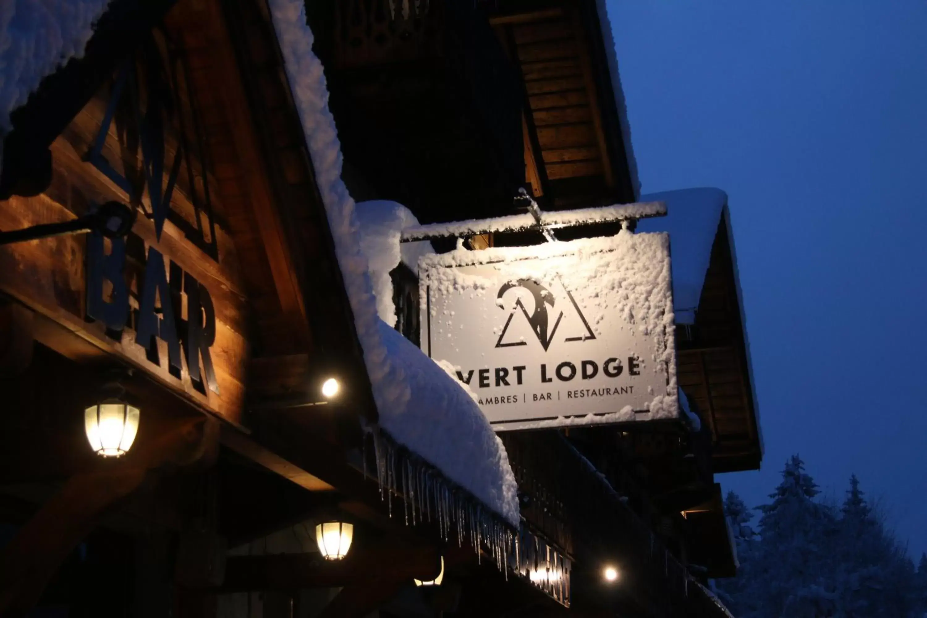 Property logo or sign in Vert Lodge Chamonix