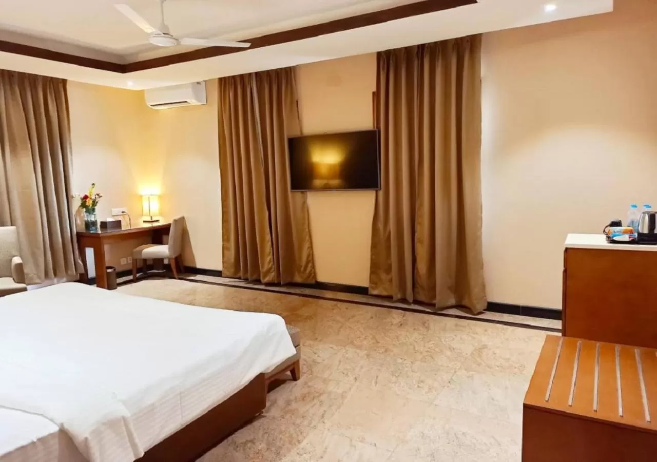 Photo of the whole room, Bed in Hotel Cachar Club