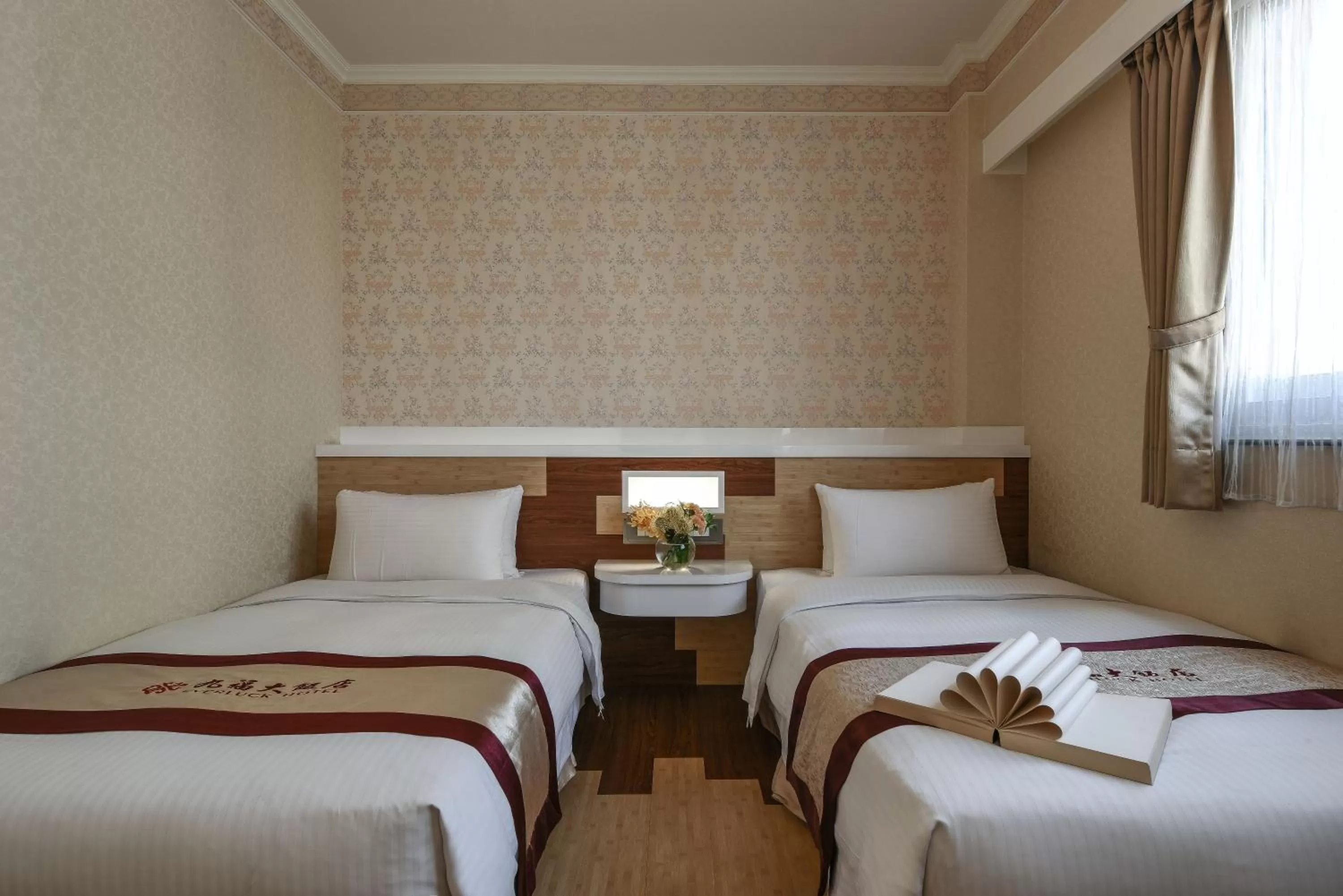 Decorative detail, Bed in Ever Luck Hotel