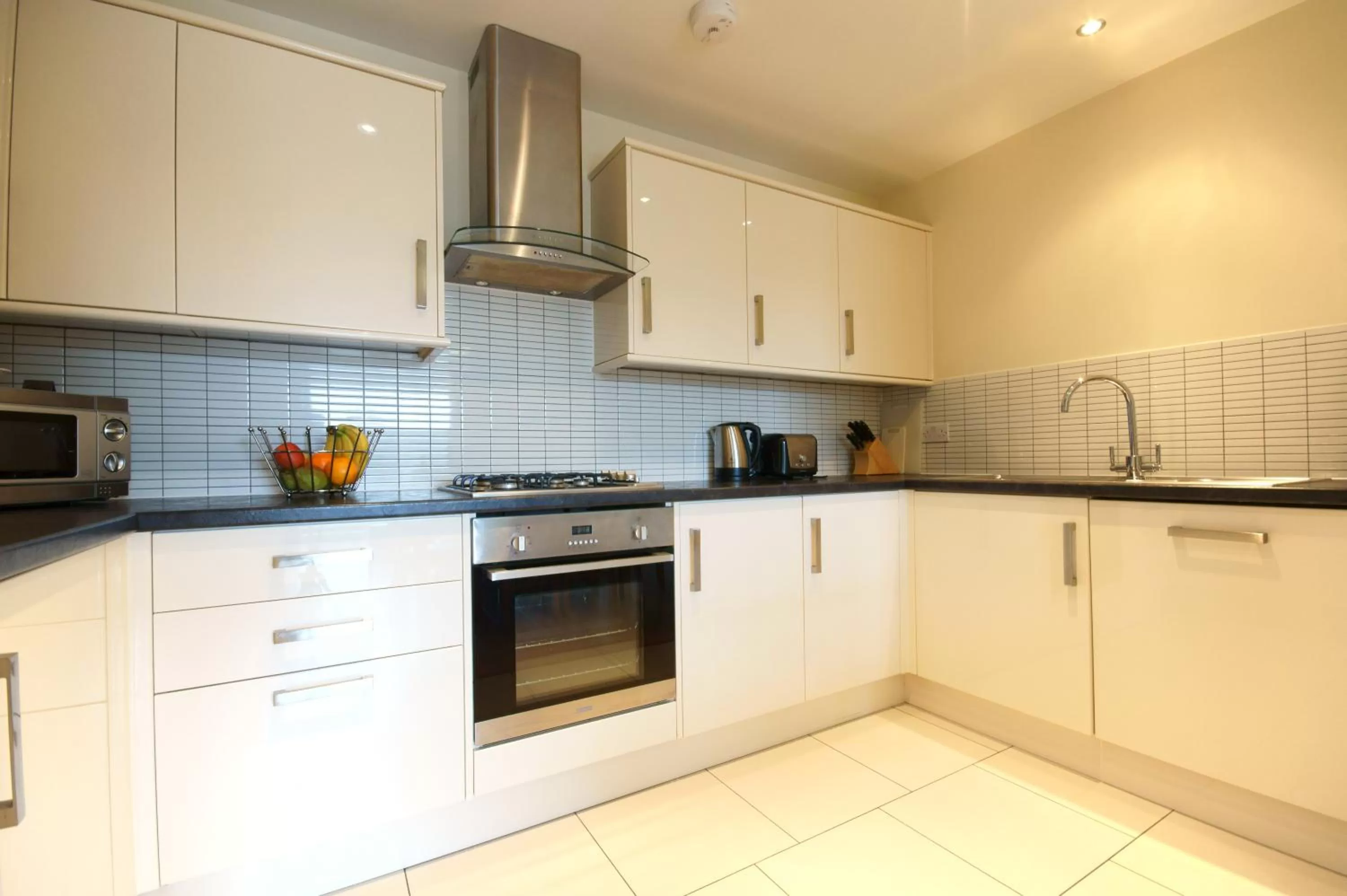 Kitchen or kitchenette in Lodge Drive Serviced Apartments