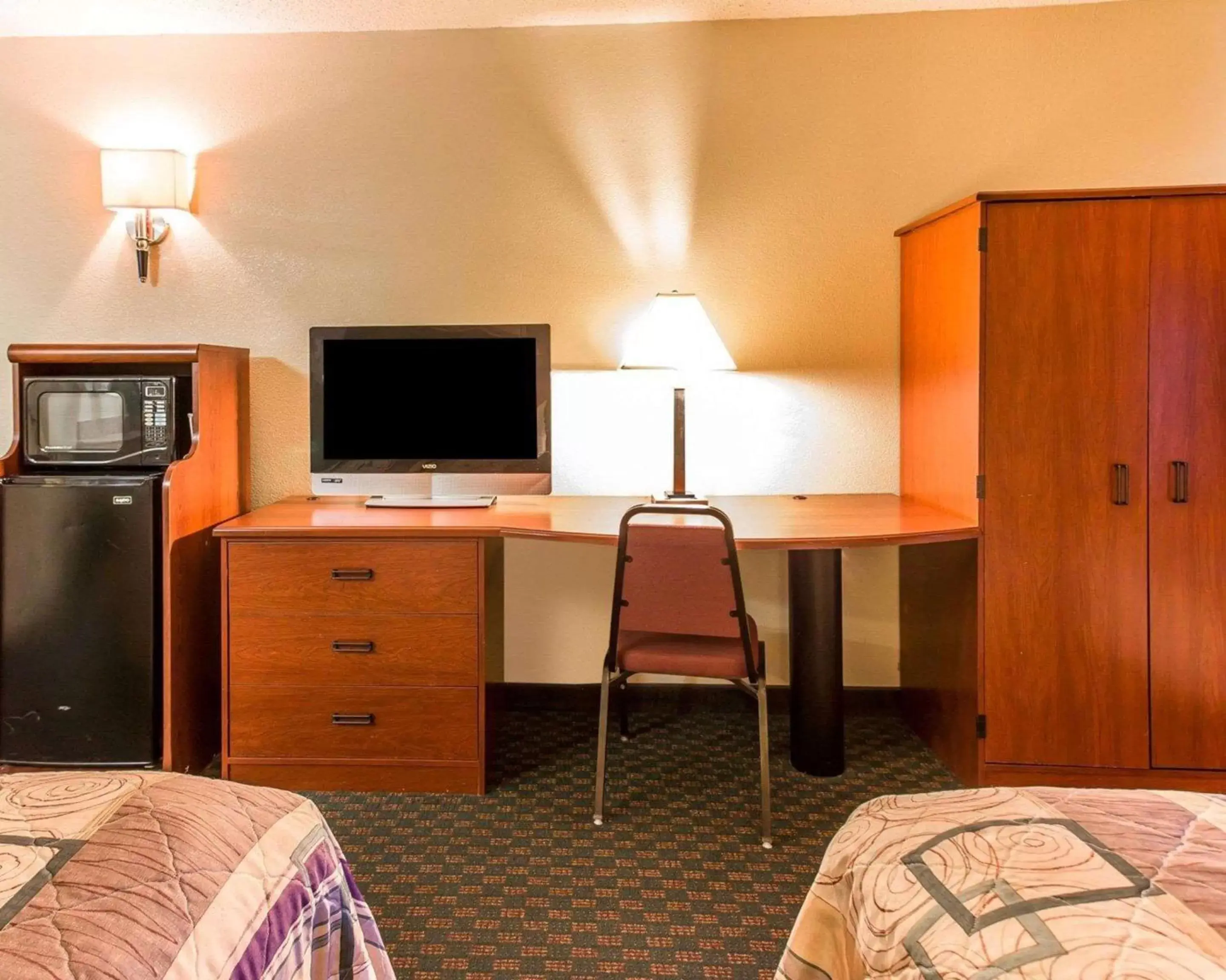 Photo of the whole room, TV/Entertainment Center in Sleep Inn Near Ft. Jackson