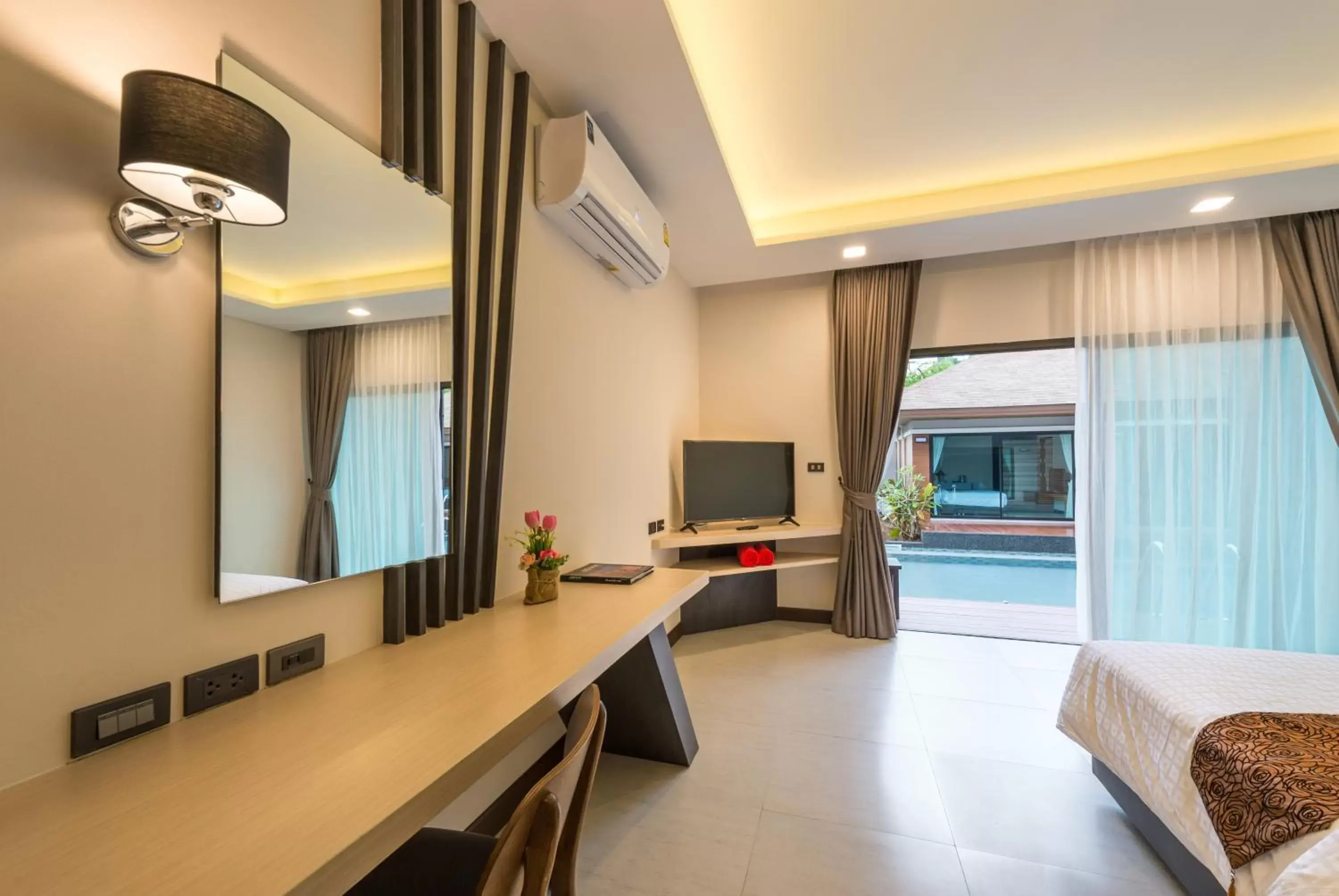 TV/Entertainment Center in Cher​mantra​ Aonang​ Resort & Pool​ Suite
