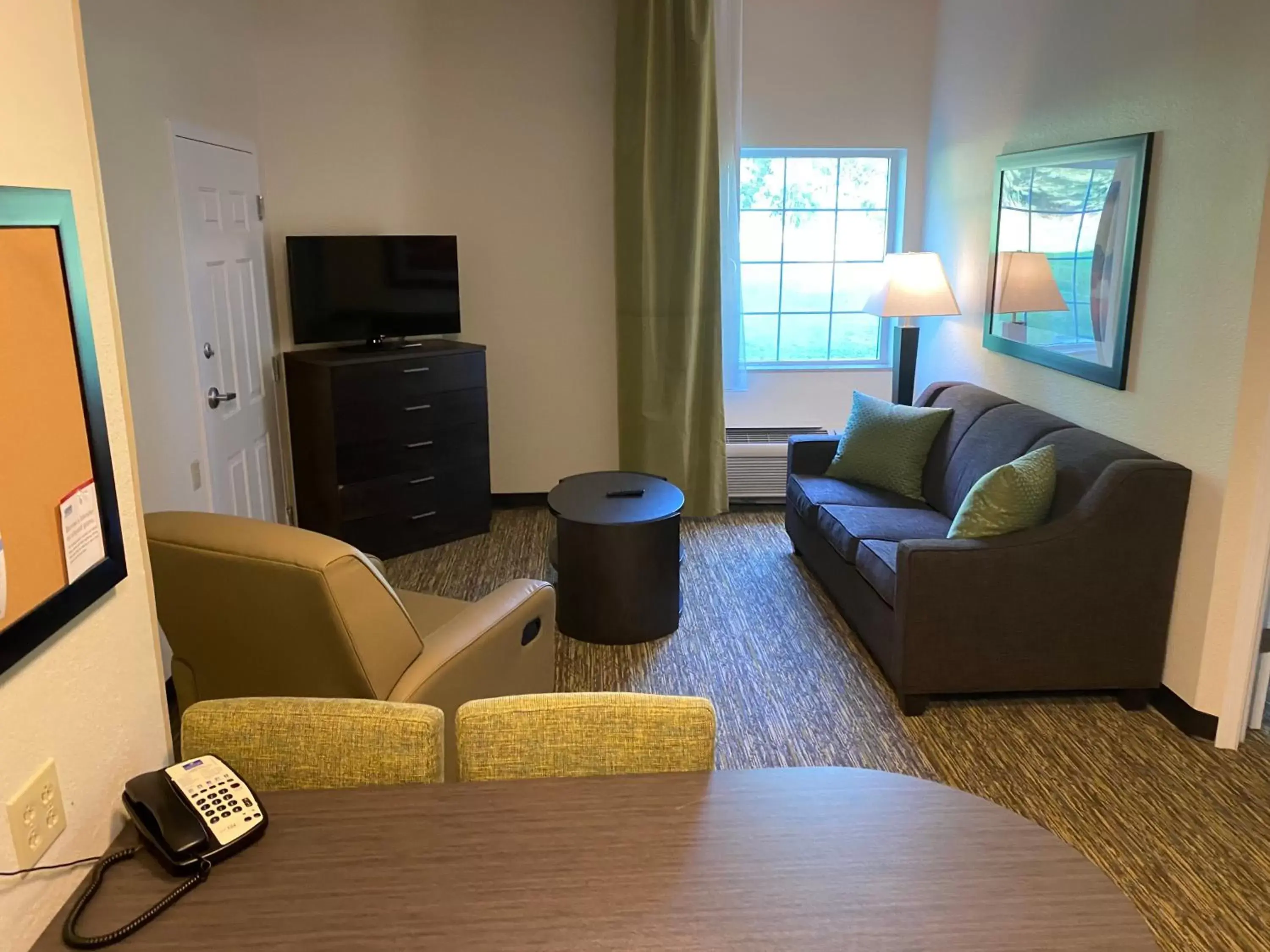 Seating Area in Candlewood Suites Hattiesburg, an IHG Hotel