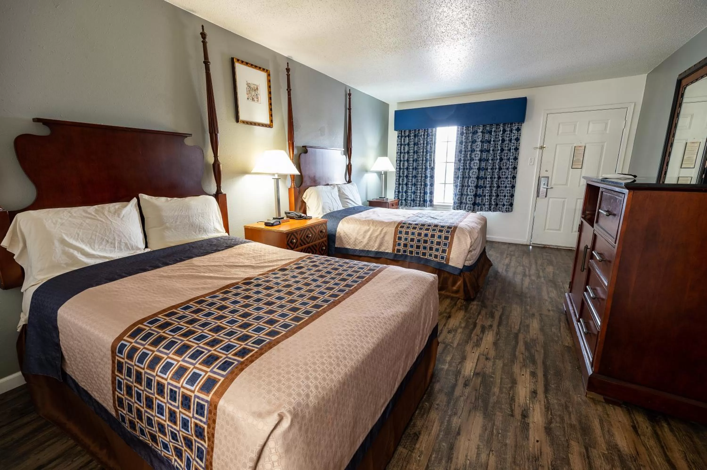 Bed in American Inn & Suites Russellville