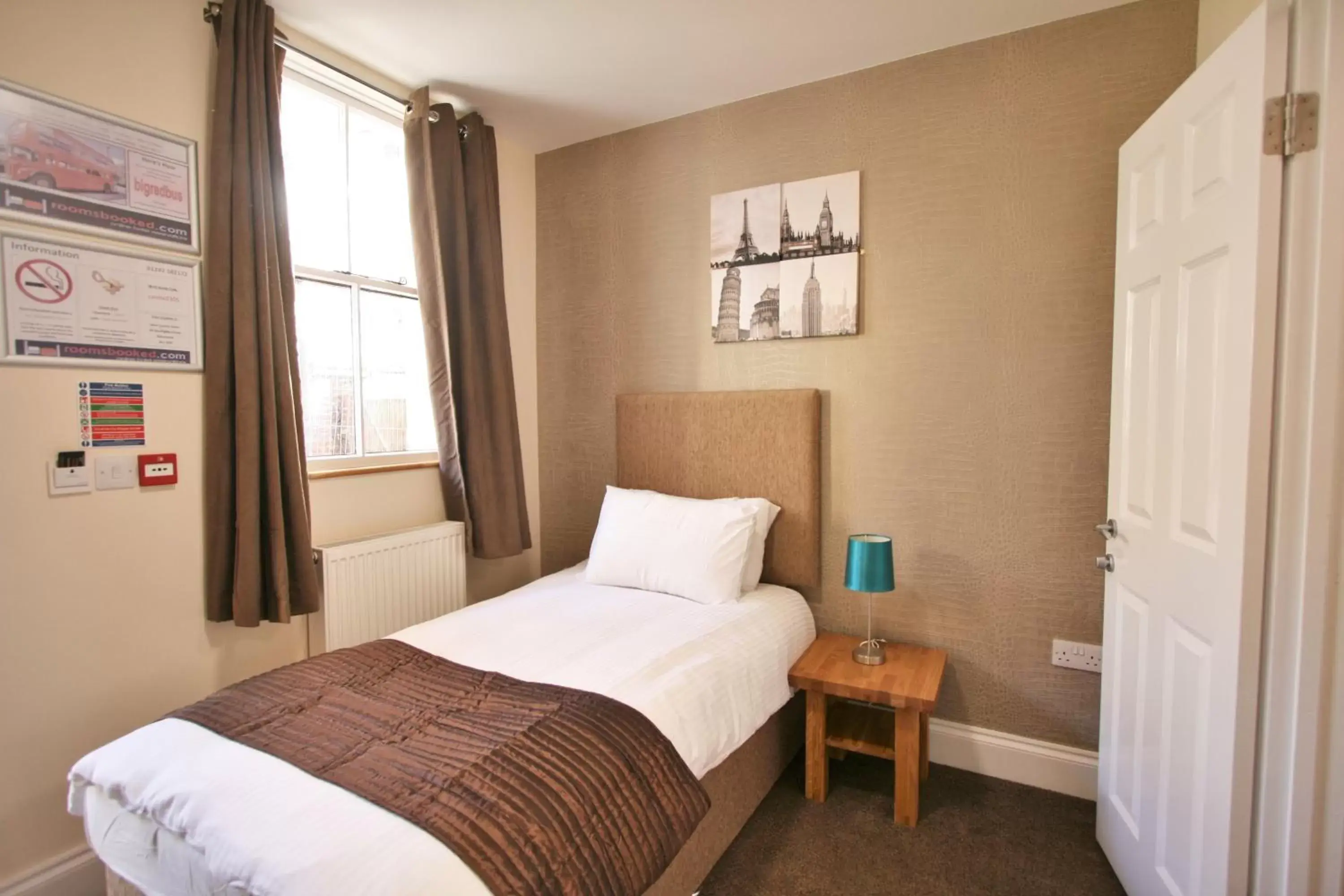 Bed in New County Hotel & Serviced Apartments by RoomsBooked