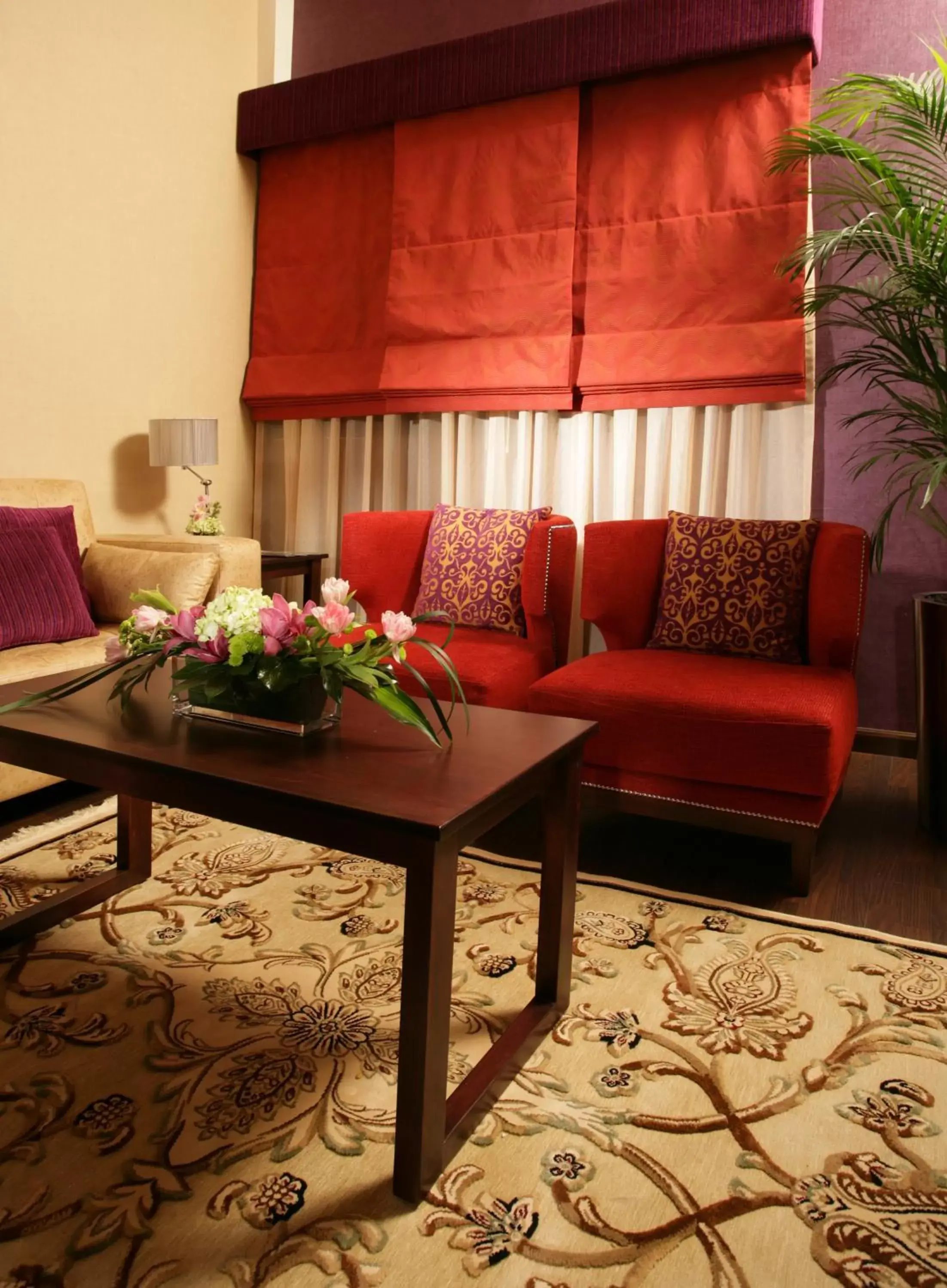 Living room in Ramada Hotel & Suites by Wyndham Ajman Living room in Ramada Hotel & Suites by Wyndham Ajman