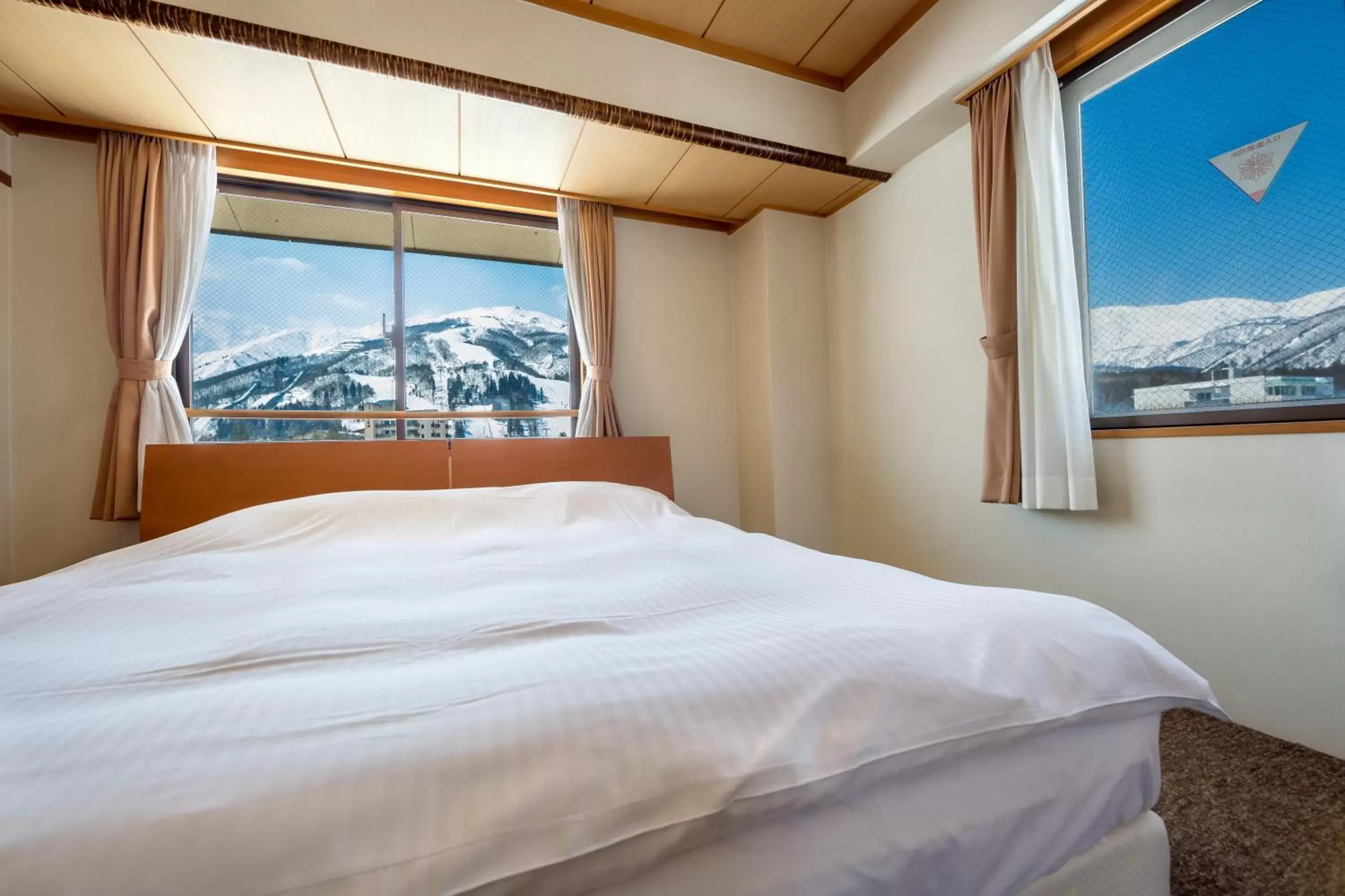 View (from property/room), Bed in Hakuba Panorama Hotel