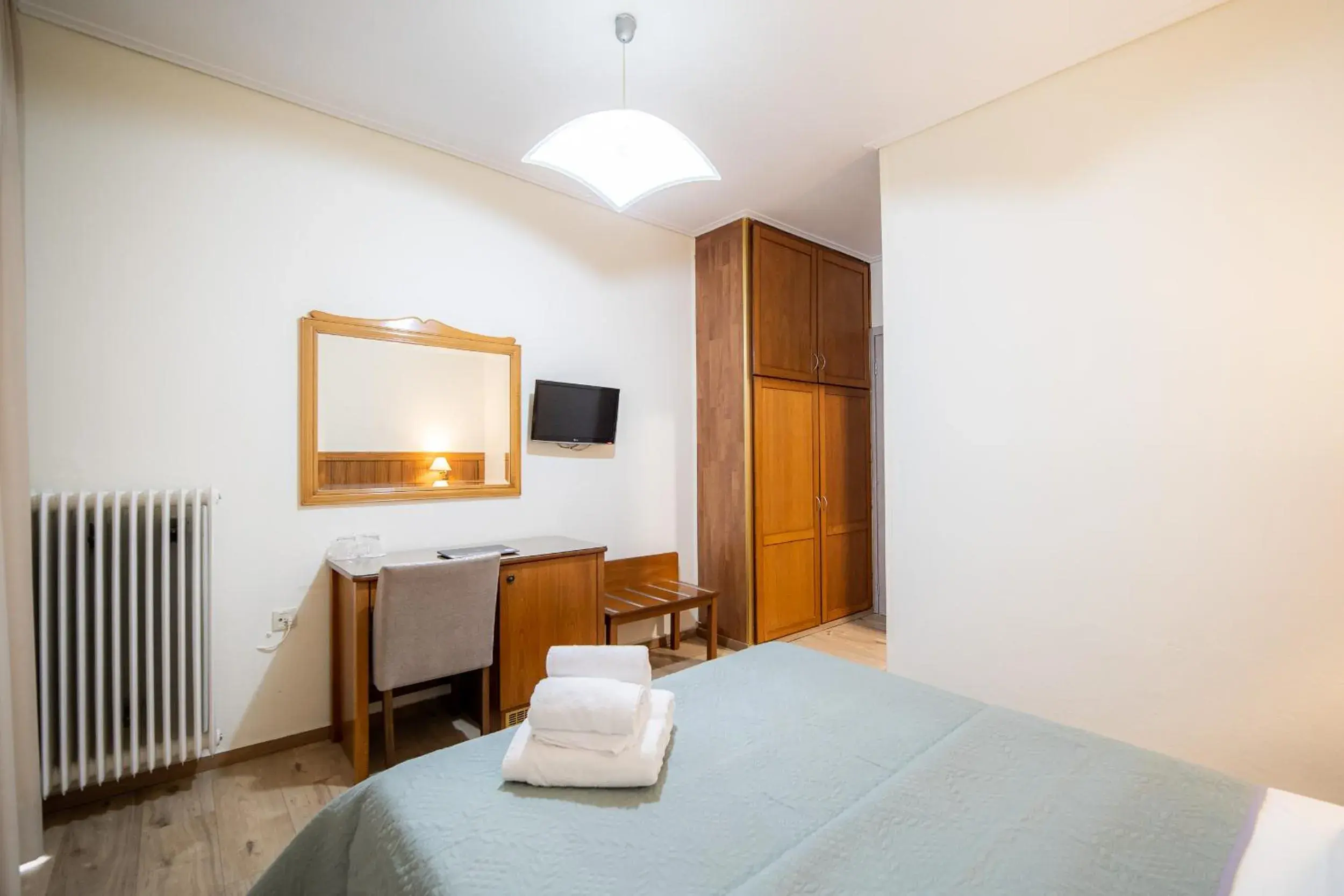 Bedroom, TV/Entertainment Center in Hotel Philippos