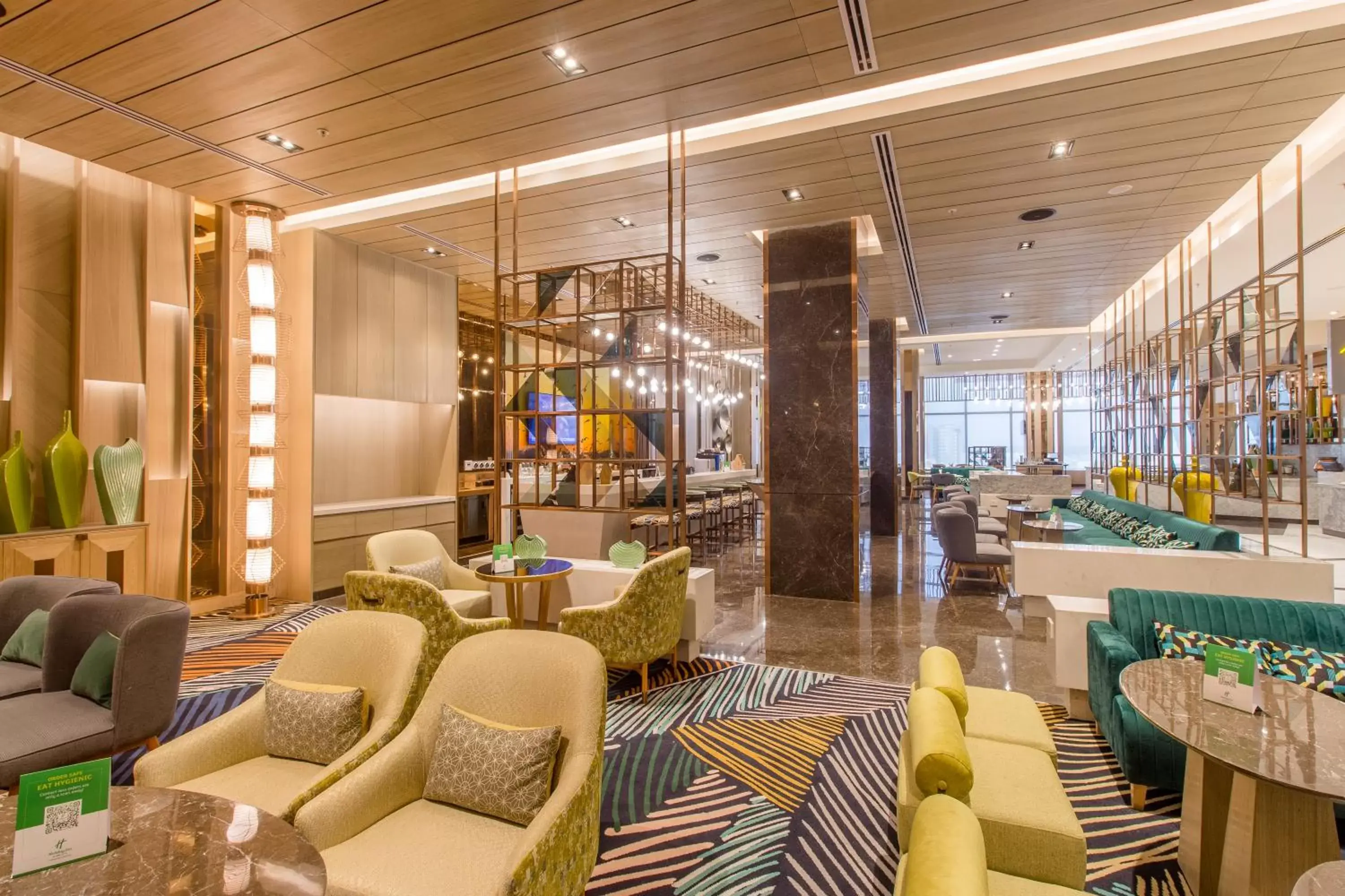 Lounge or bar, Lobby/Reception in Holiday Inn Chandigarh Zirakpur, an IHG Hotel