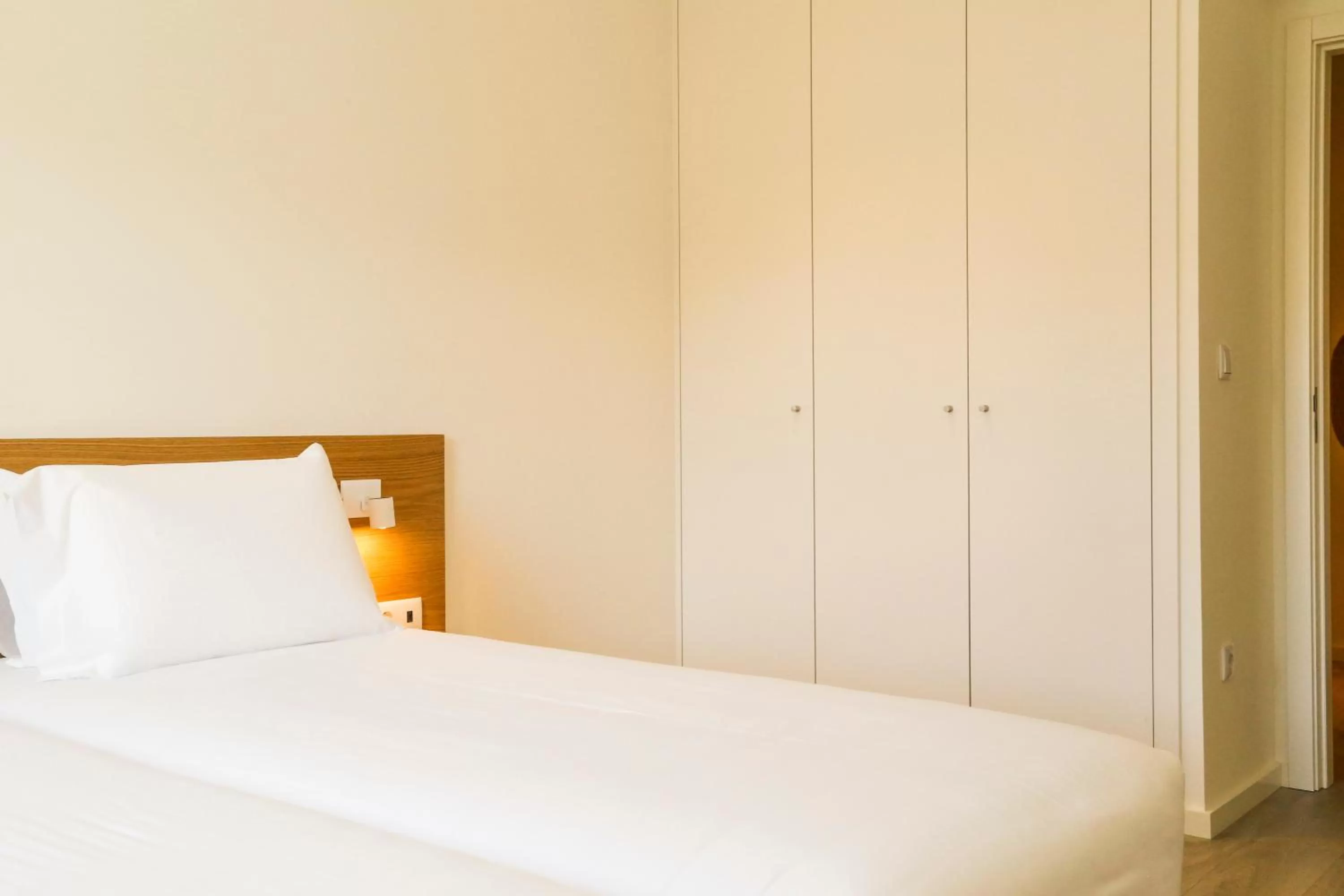 Bed in Hotel Spot Family Suites