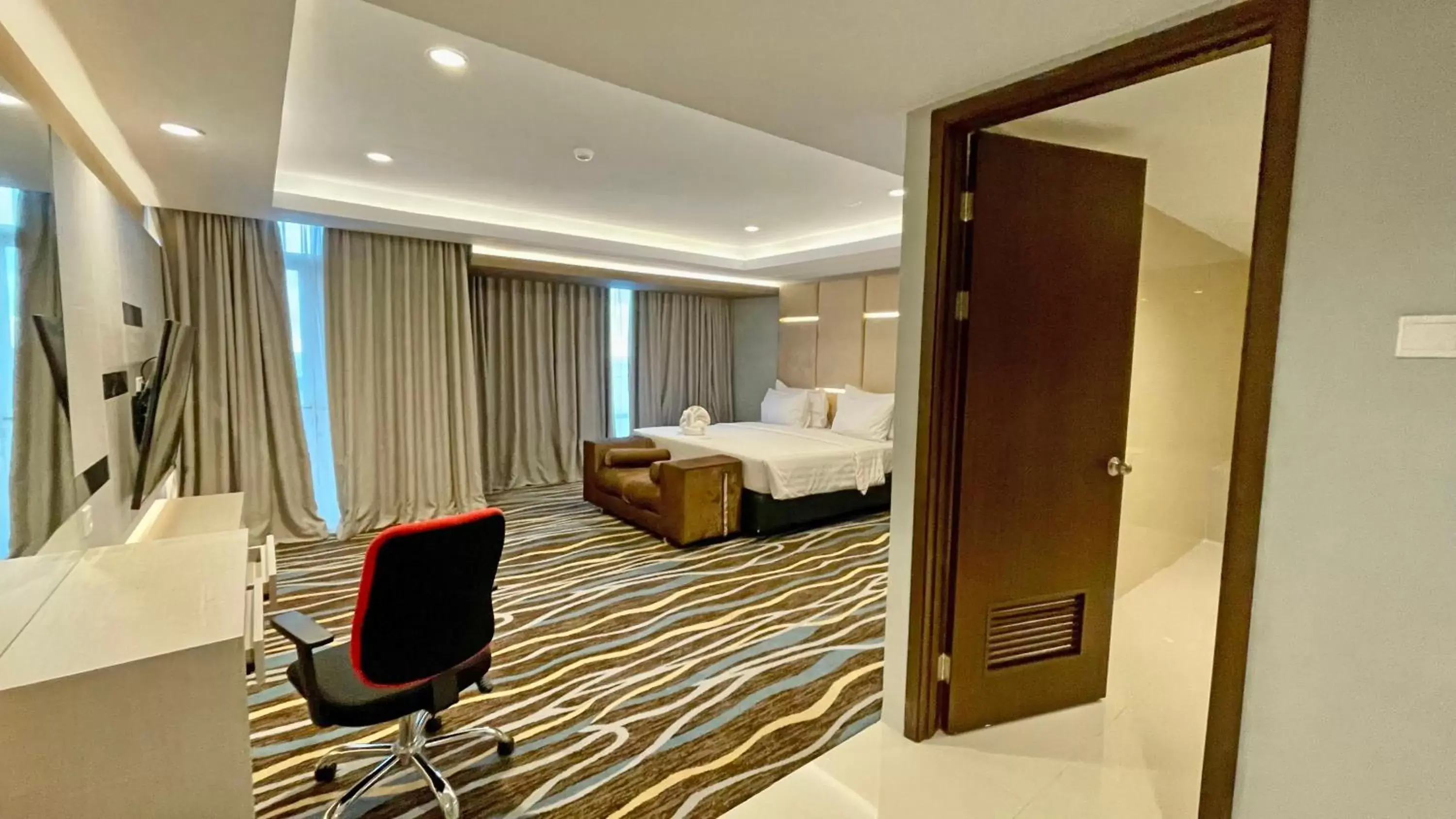 Photo of the whole room in Swiss-Belhotel Makassar