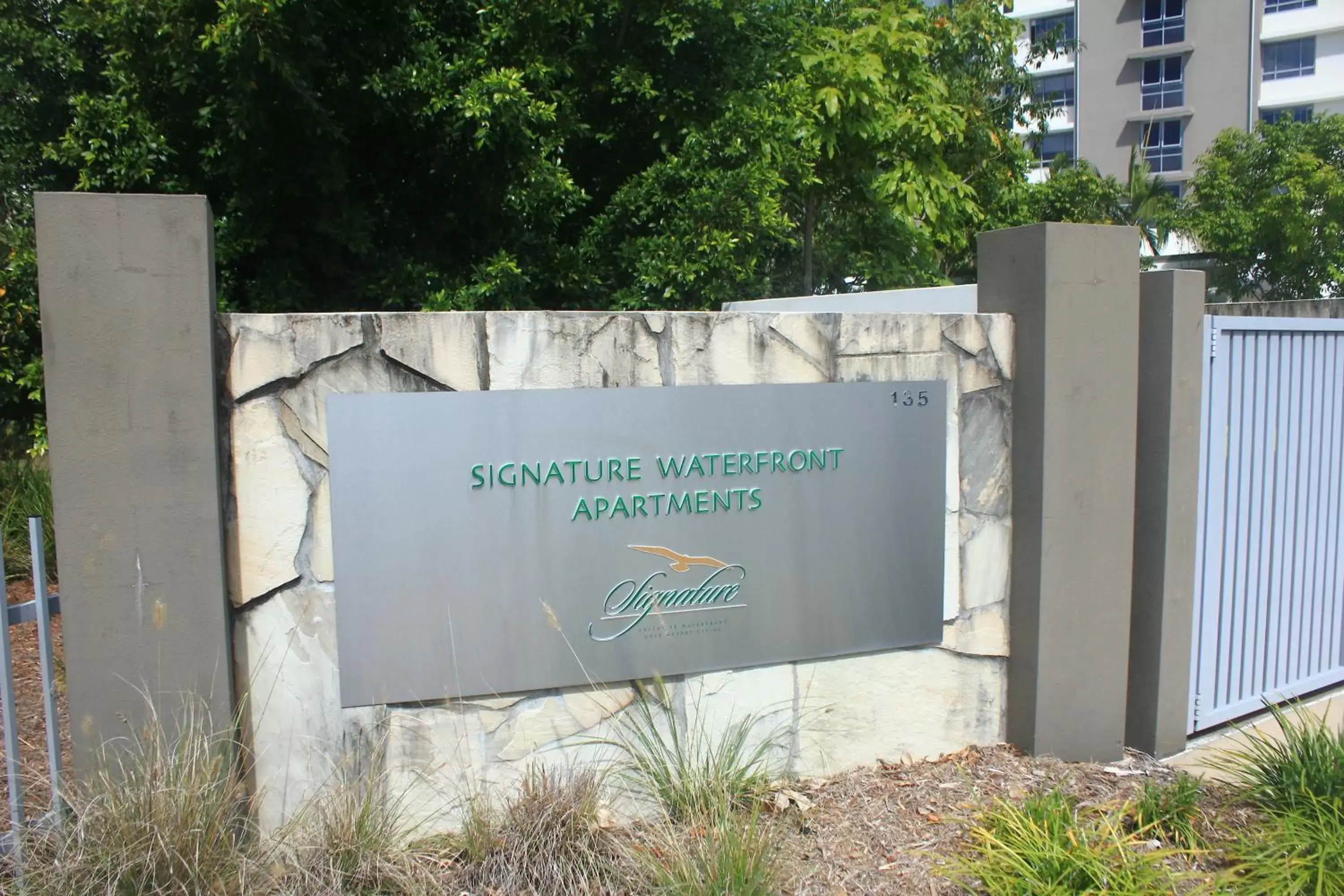 Facade/entrance, Property Logo/Sign in Signature Waterfront Apartments