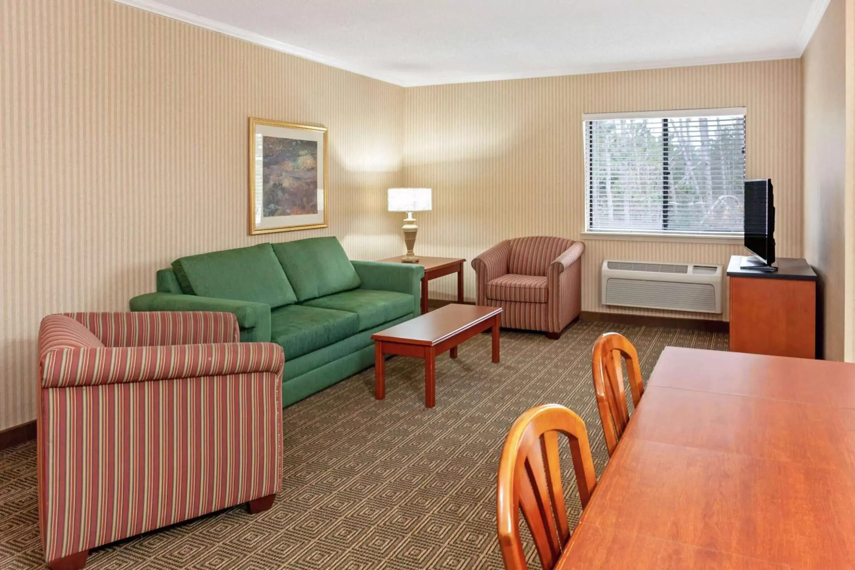 Photo of the whole room, Seating Area in La Quinta by Wyndham Stevens Point