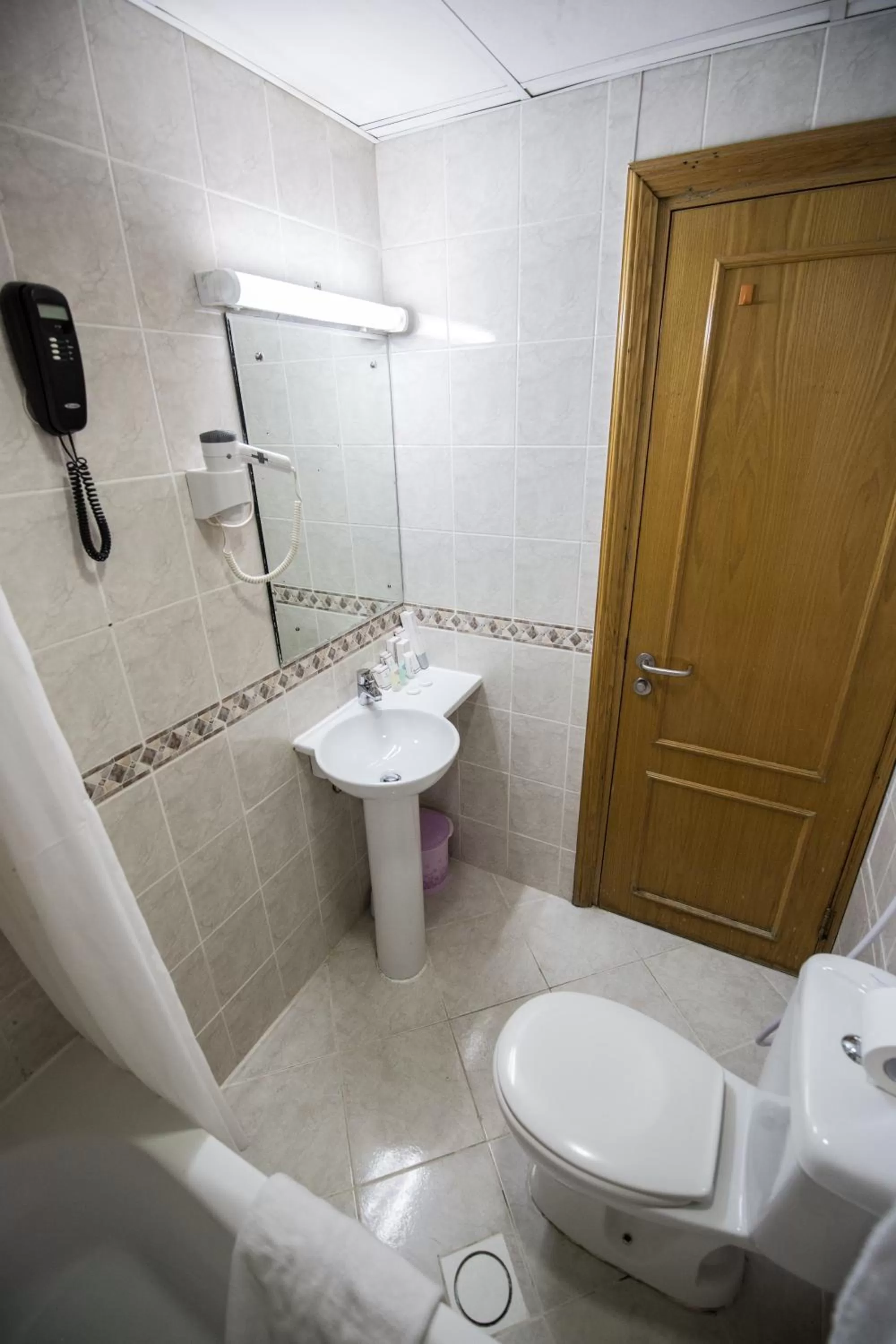 Bathroom in Welcome Hotel Apartments 1