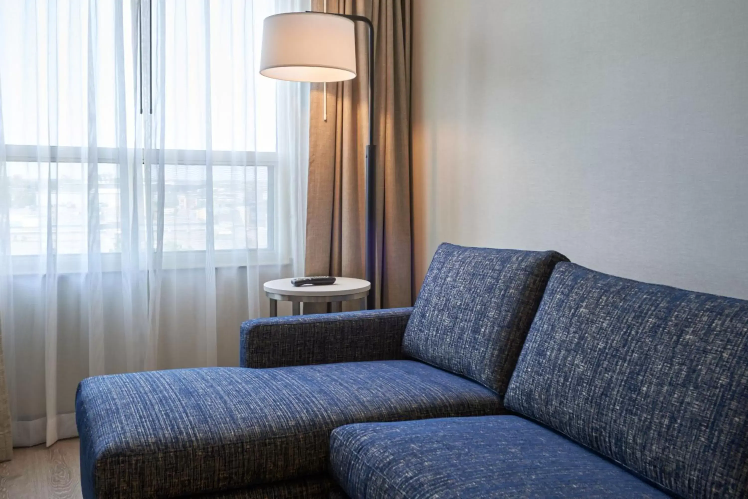 Photo of the whole room, Seating Area in Holiday Inn & Suites Ottawa Kanata, an IHG Hotel