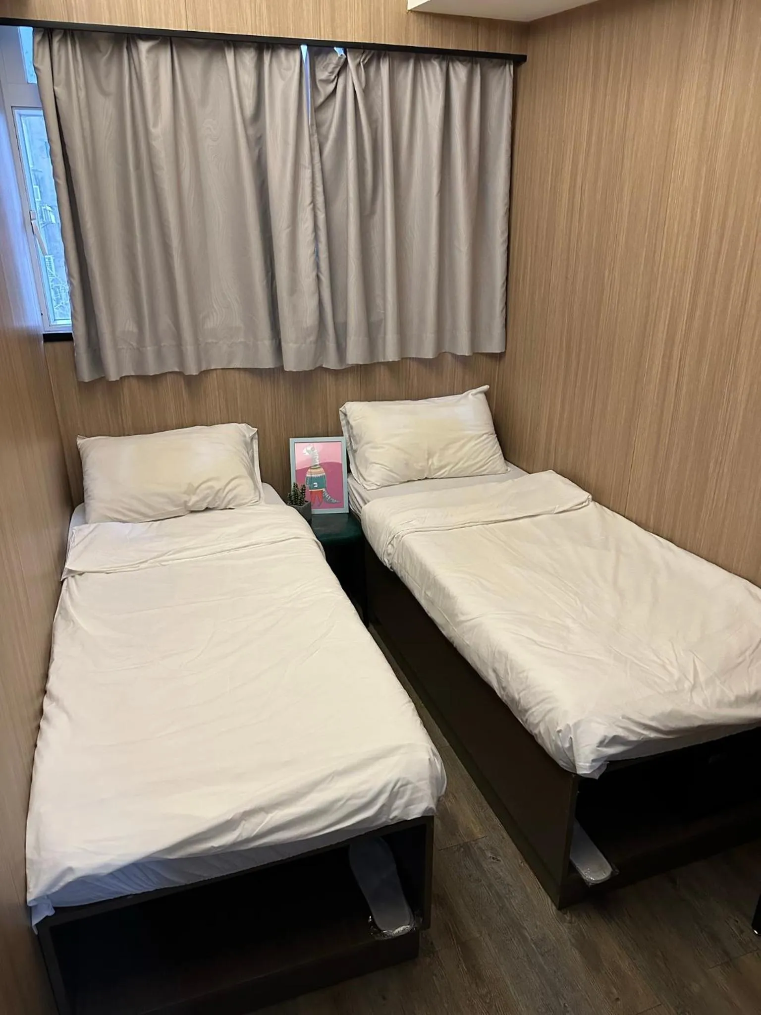 Bed in Homy Inn North Point