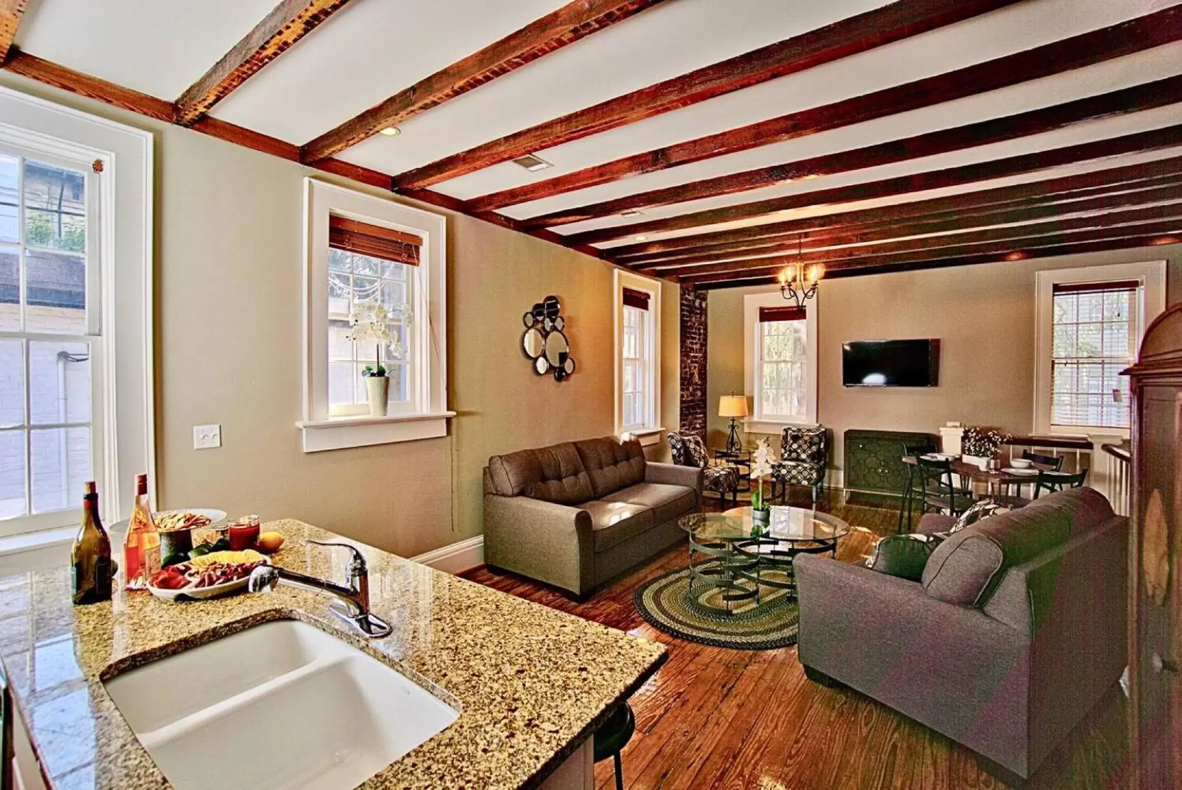 Living room, Seating Area in Comfy Carriage House Steps from the River