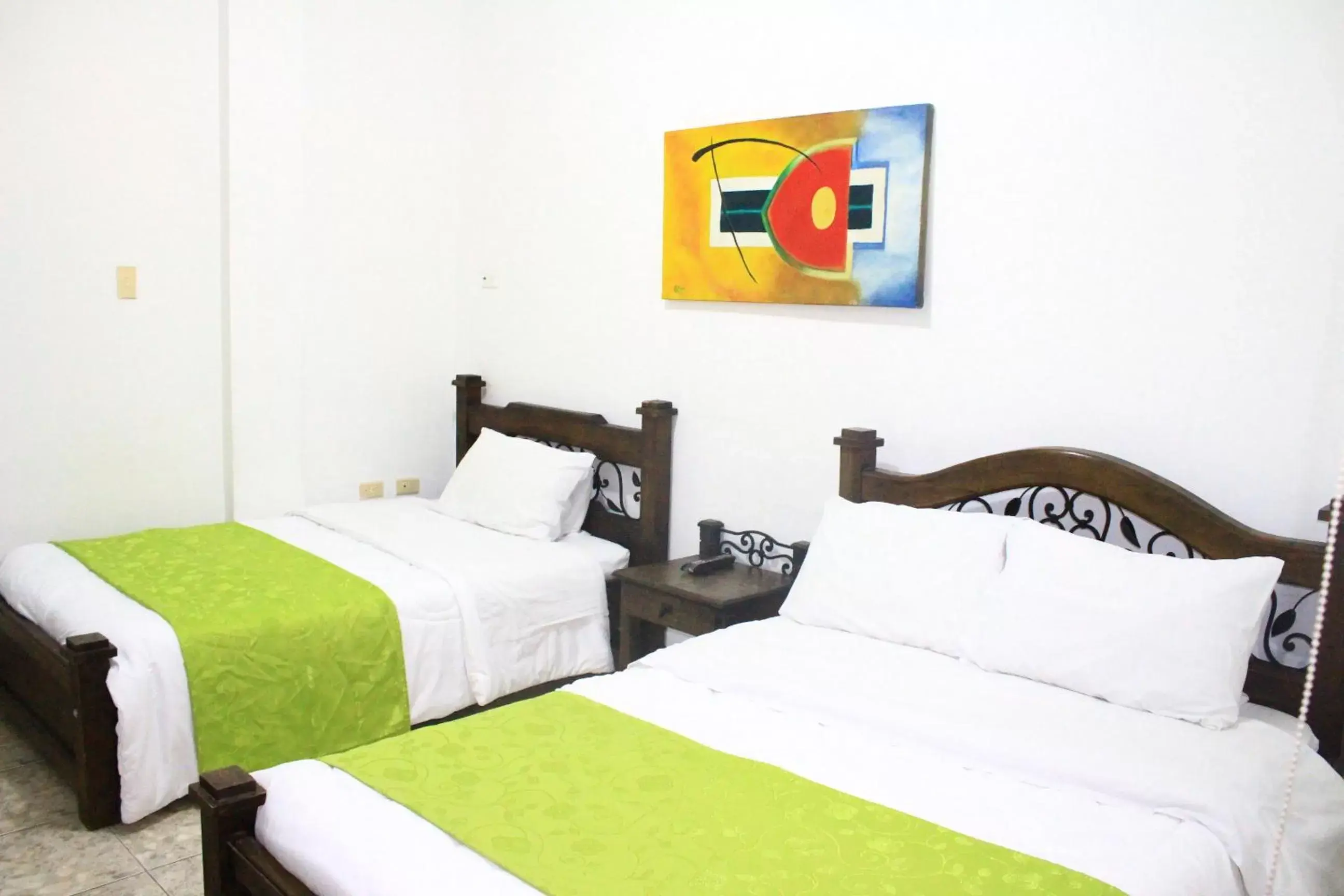 Triple Room in Hotel Colonial Manizales Triple Room in Hotel Colonial Manizales