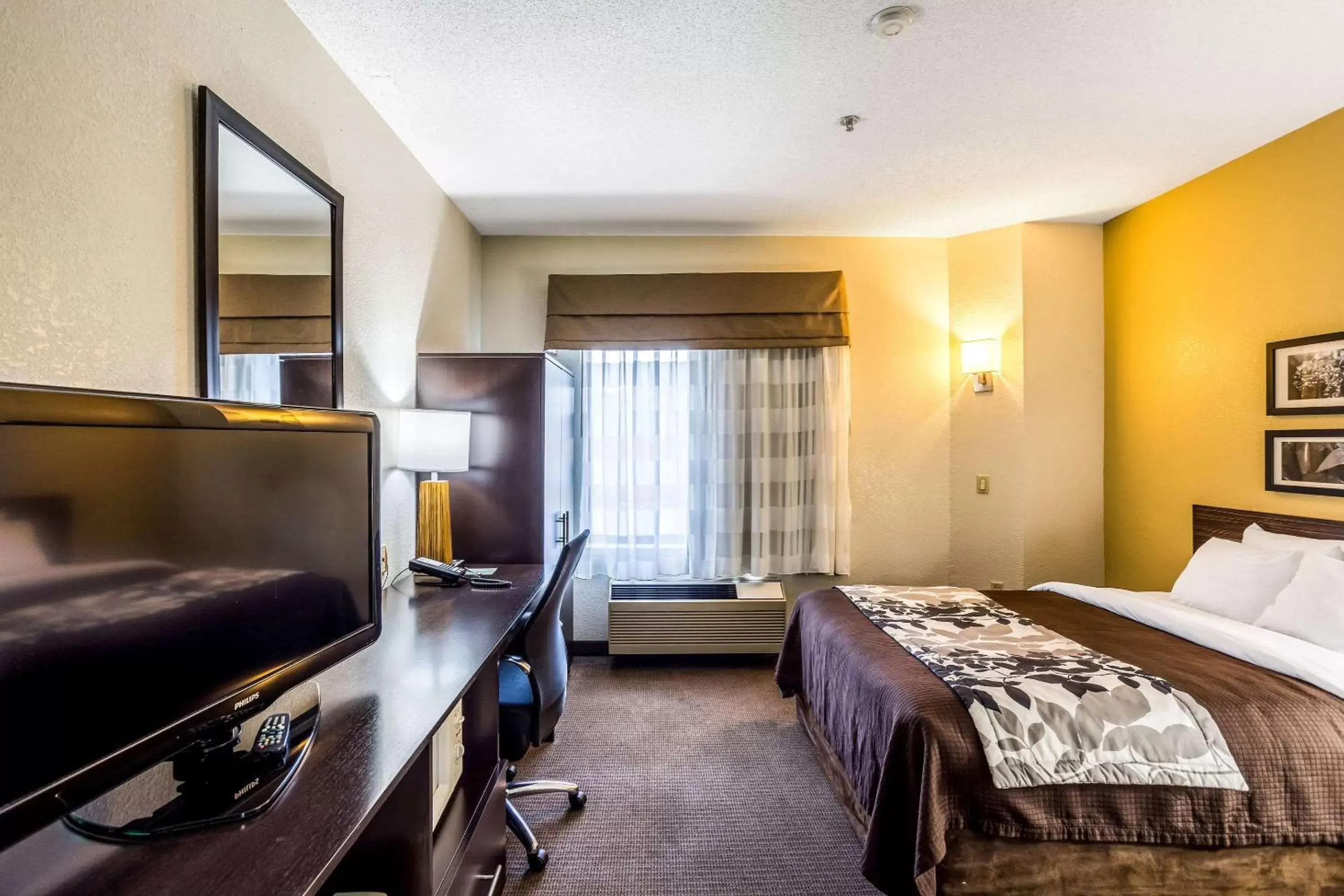 Photo of the whole room, TV/Entertainment Center in Sleep Inn Owensboro