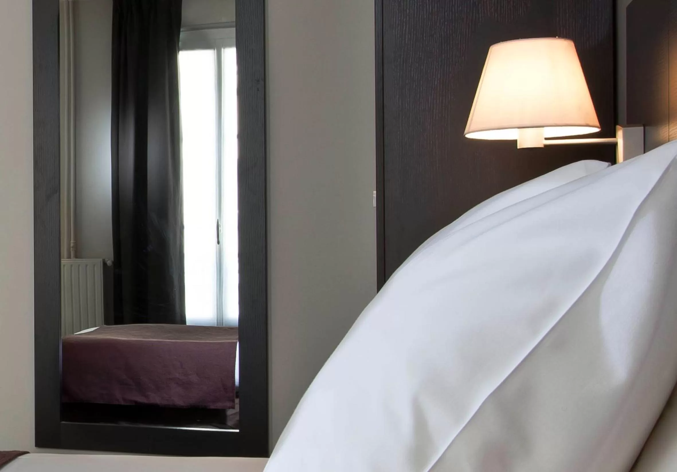 Bed in Hôtel des Ecrivains