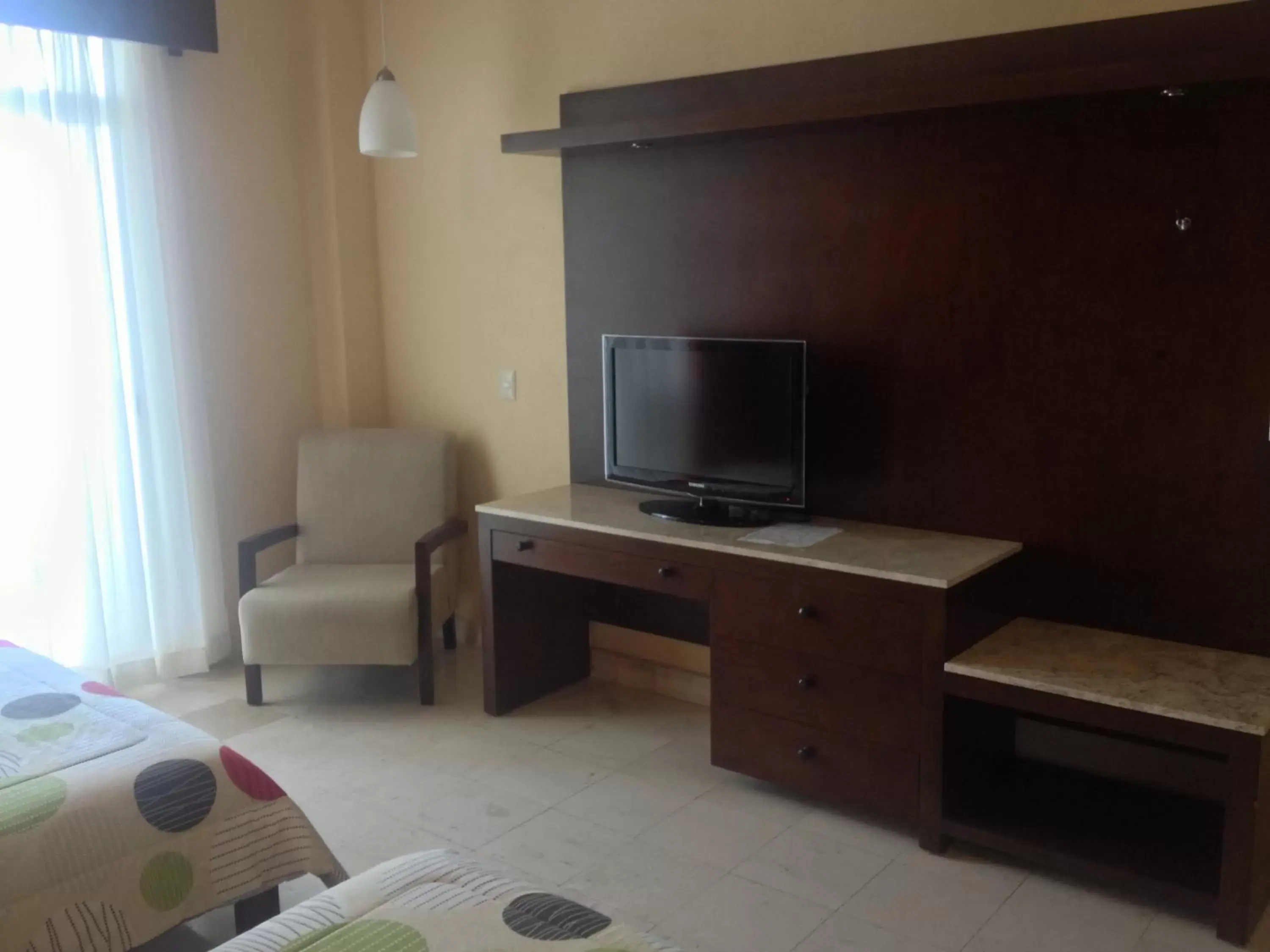 TV and multimedia, TV/Entertainment Center in Hotel Bogavante