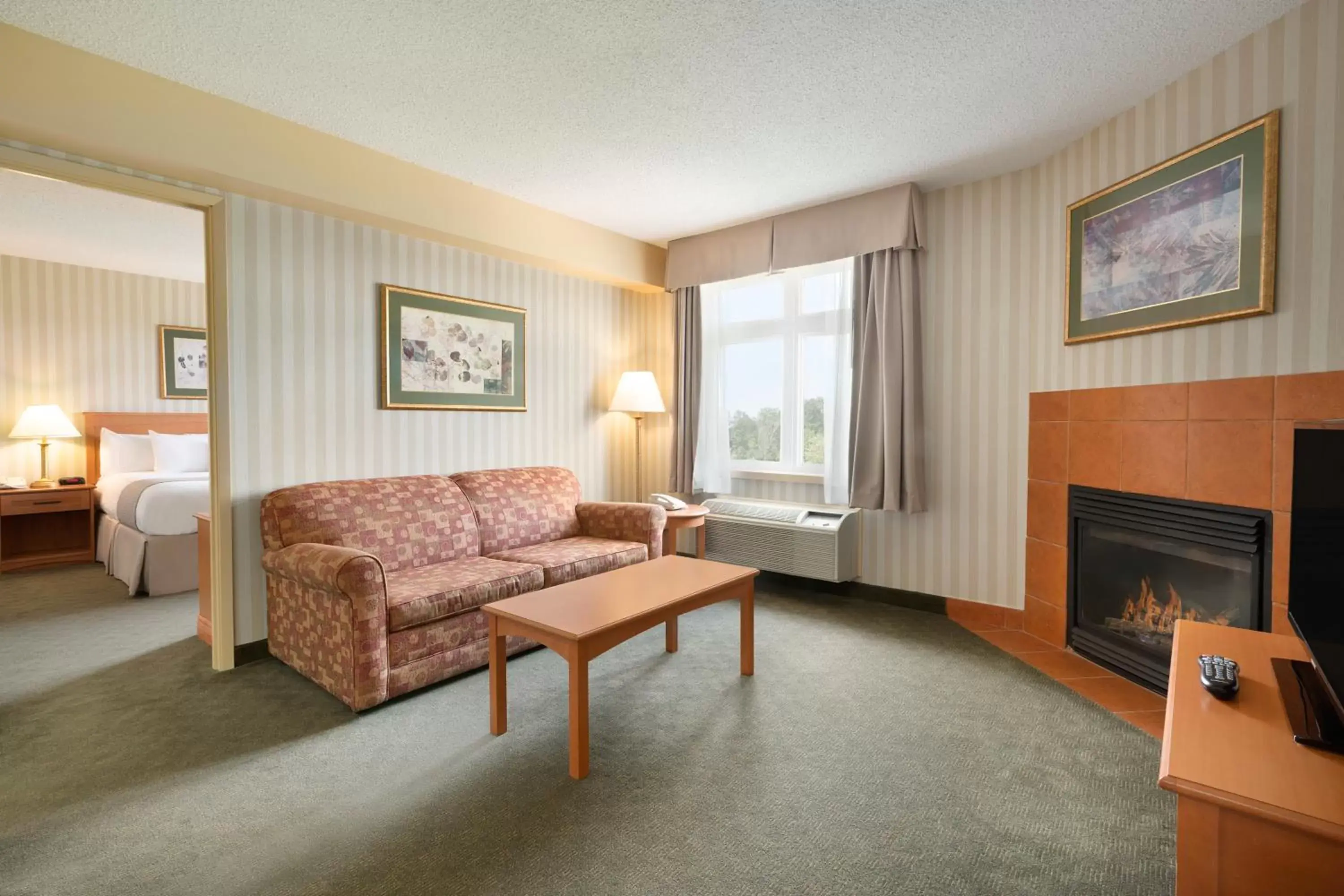 Bedroom, Seating Area in Days Inn by Wyndham Orillia
