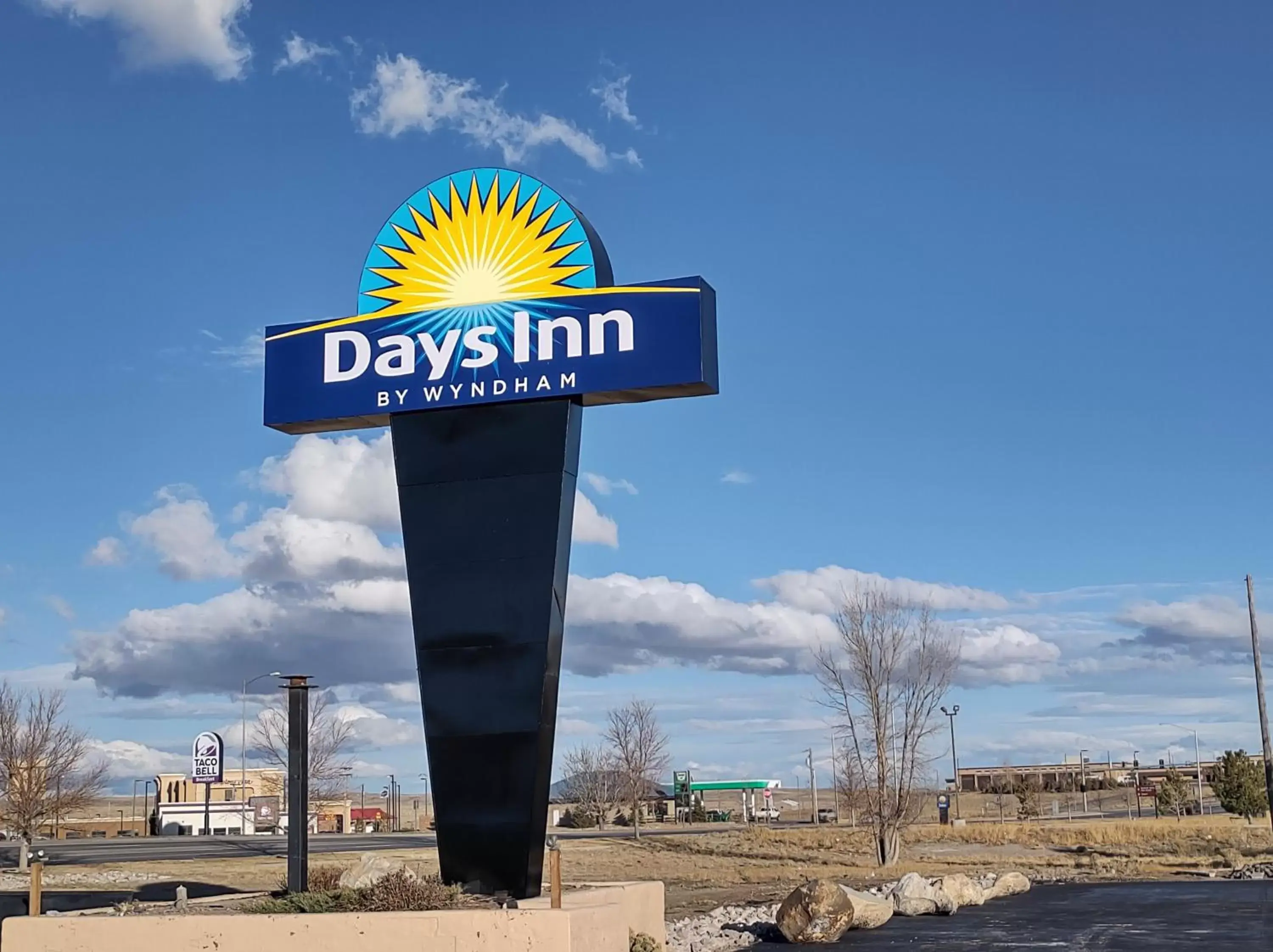 Property logo or sign in Days Inn by Wyndham Rawlins