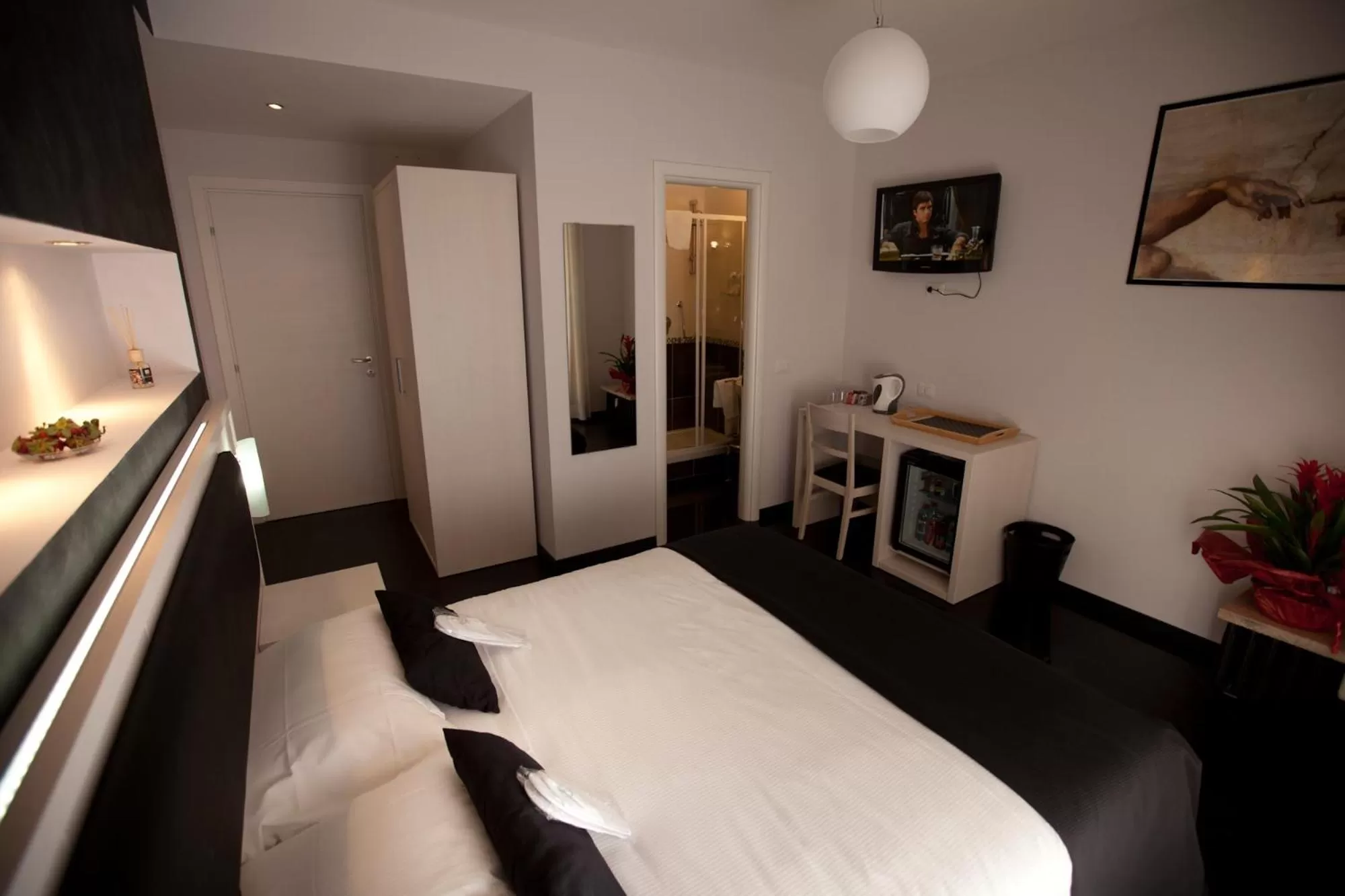 Seating area, Bed in Heart of Rome Rooms