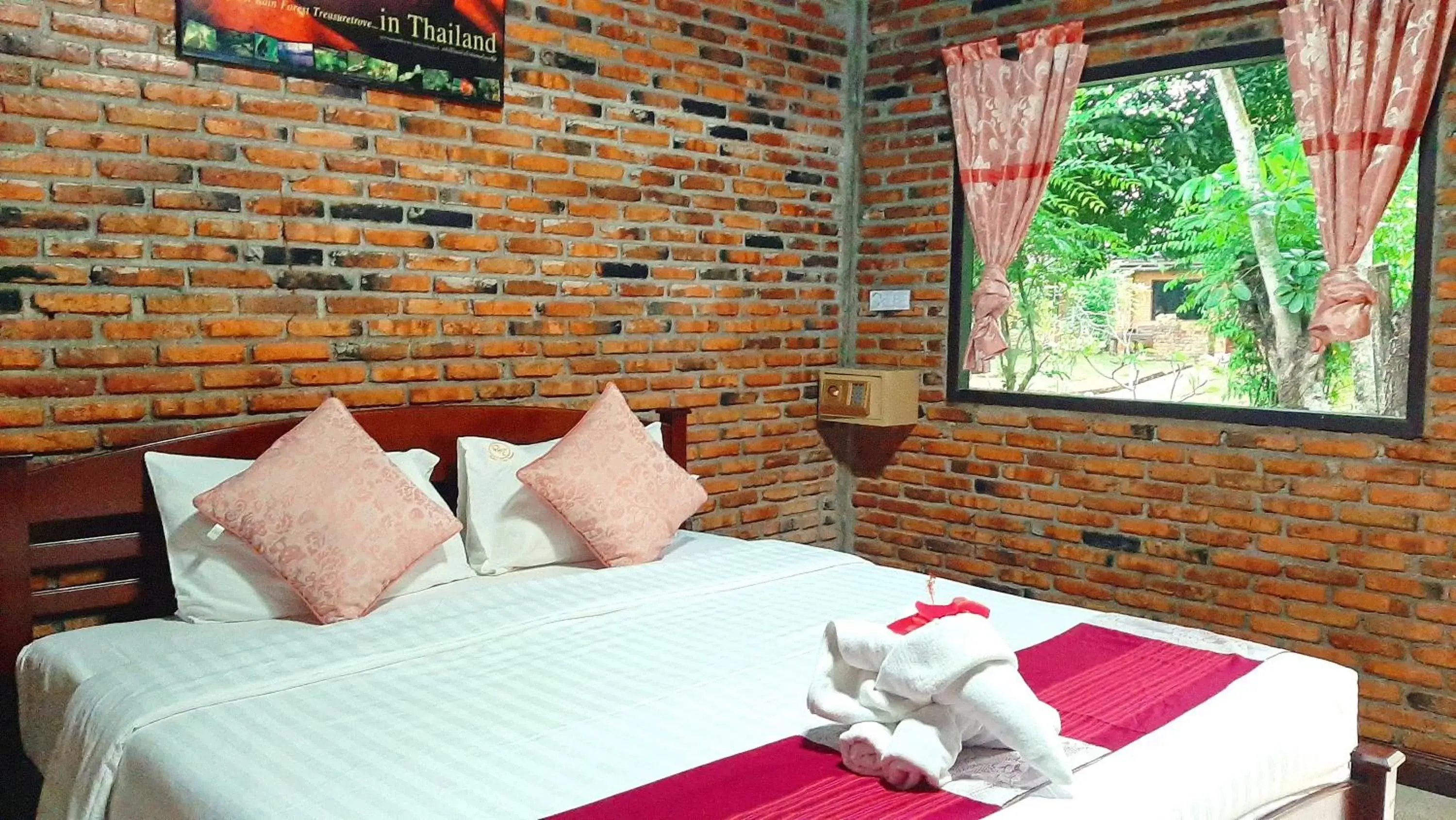 Bed in Doo Dee Boutique Resort by Swiss Chalet