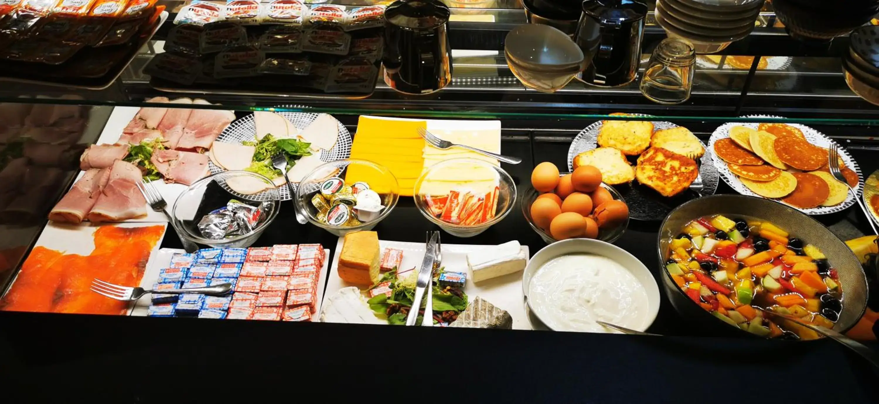 Buffet breakfast in Hotel Acadie Eragny ( ex Comfort Hotel)