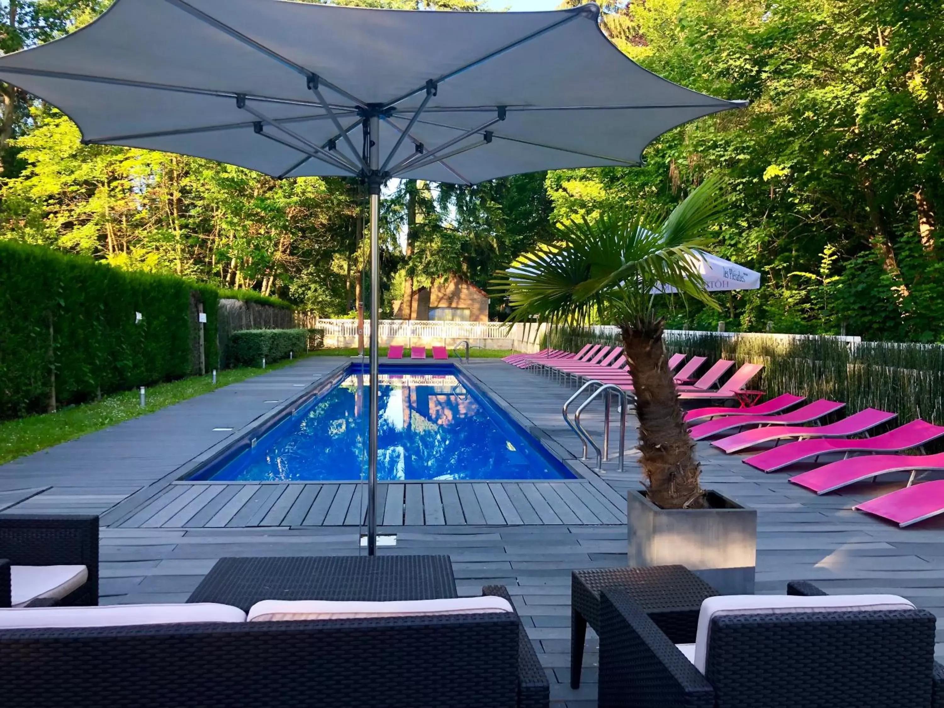 Swimming Pool in Les Pleiades Hôtel-Spa-Restaurant