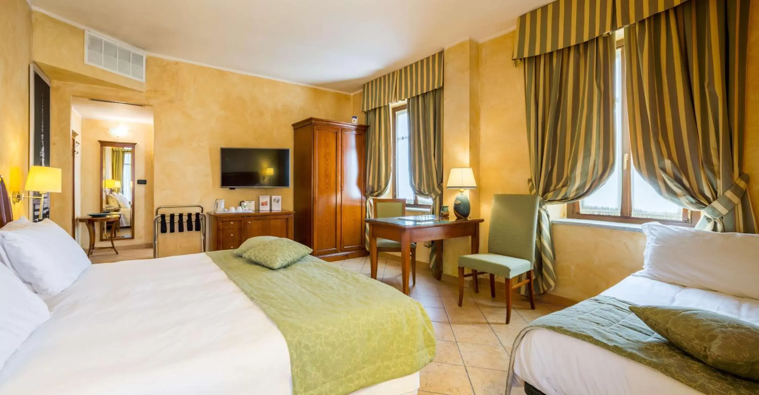 Bedroom in Best Western Plus Hotel Le Rondini