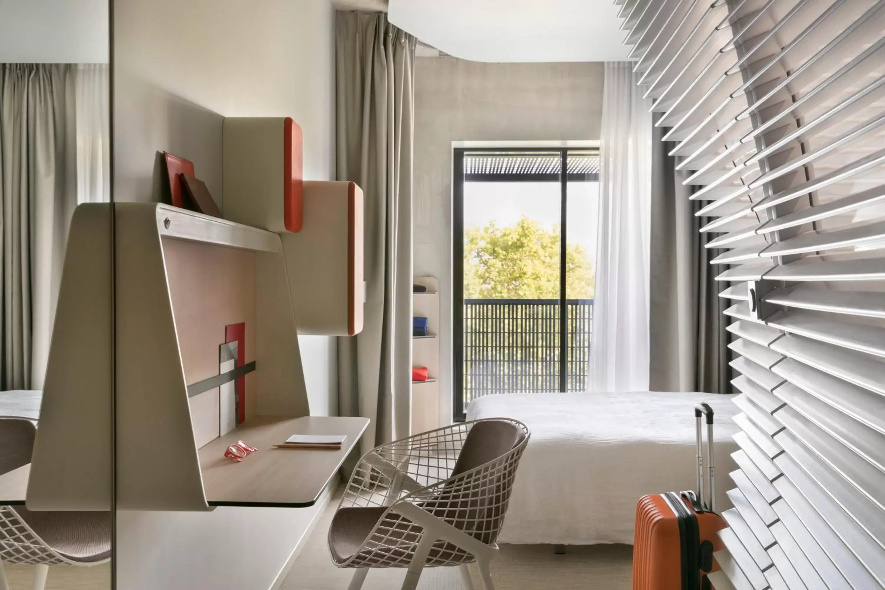 Bedroom, Seating Area in Okko Hotels Strasbourg Centre