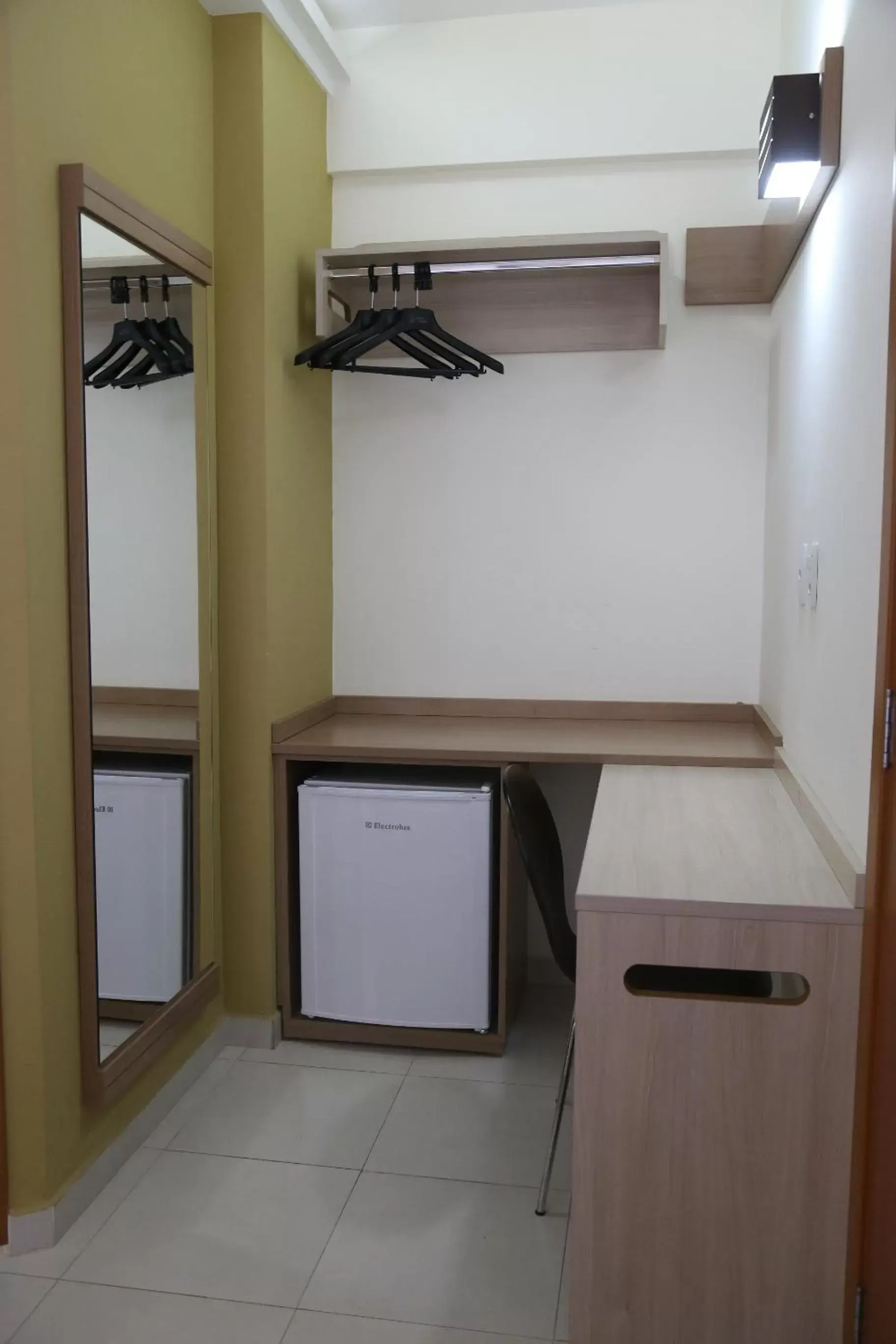 Bedroom, Kitchen/Kitchenette in Larison Hotéis - Porto Velho