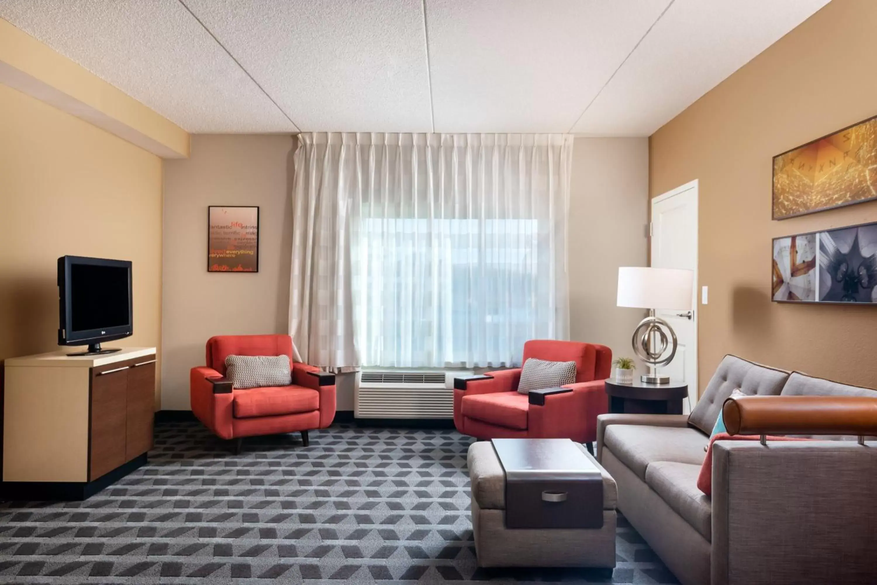Living room, Seating Area in TownePlace Suites by Marriott Charlotte Mooresville