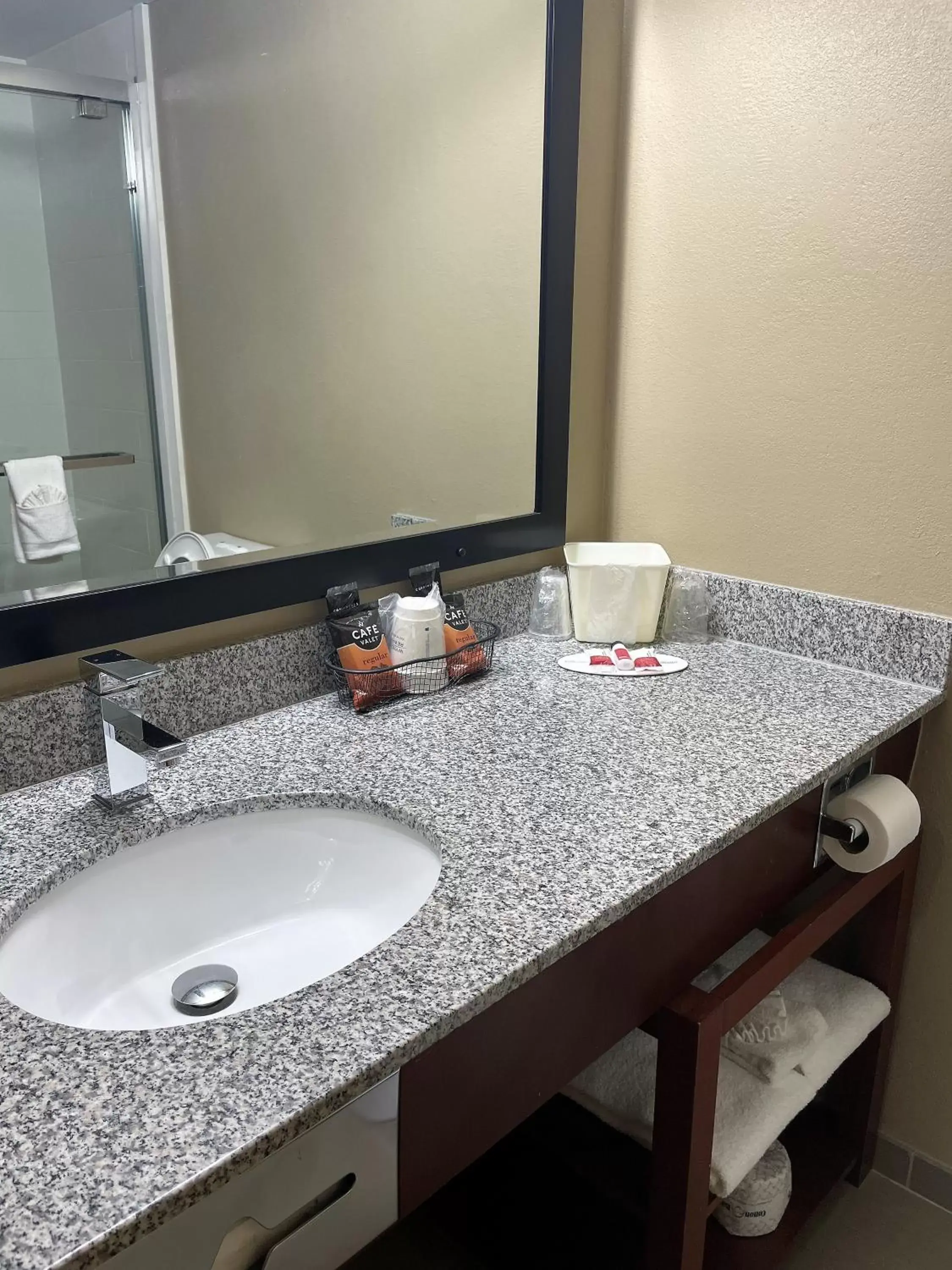 Bathroom in Super 8 by Wyndham Raleigh North East